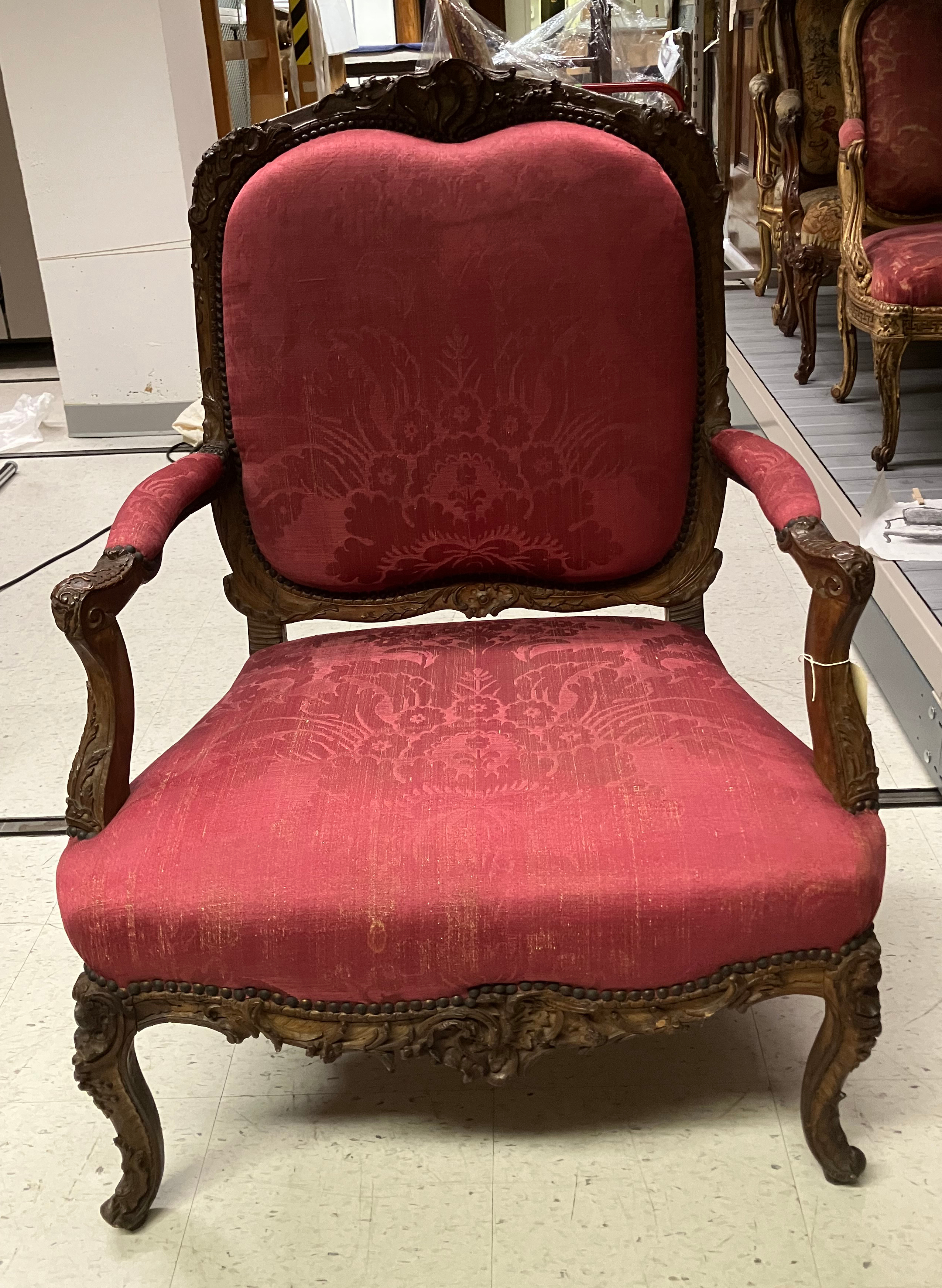 Antique Carved Red Upholstered Armchair
