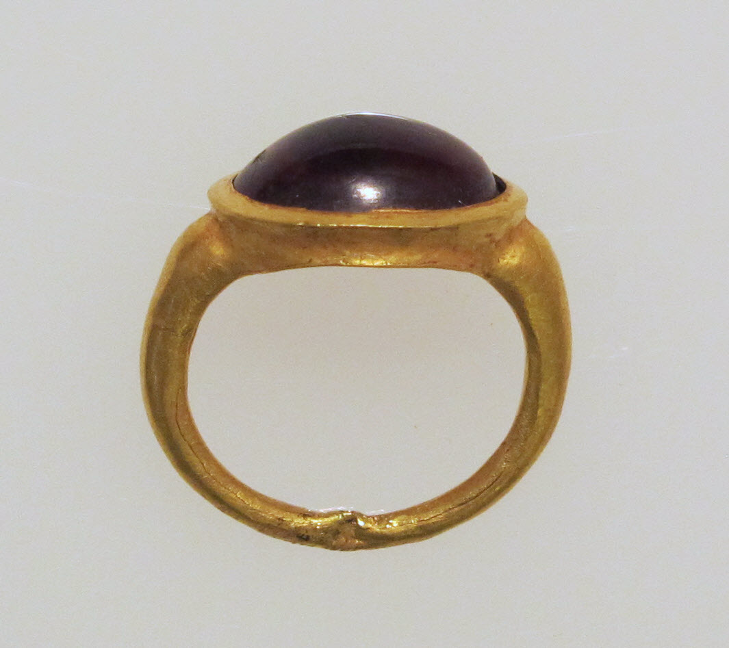 Antique Gold Ring with Dark Gemstone