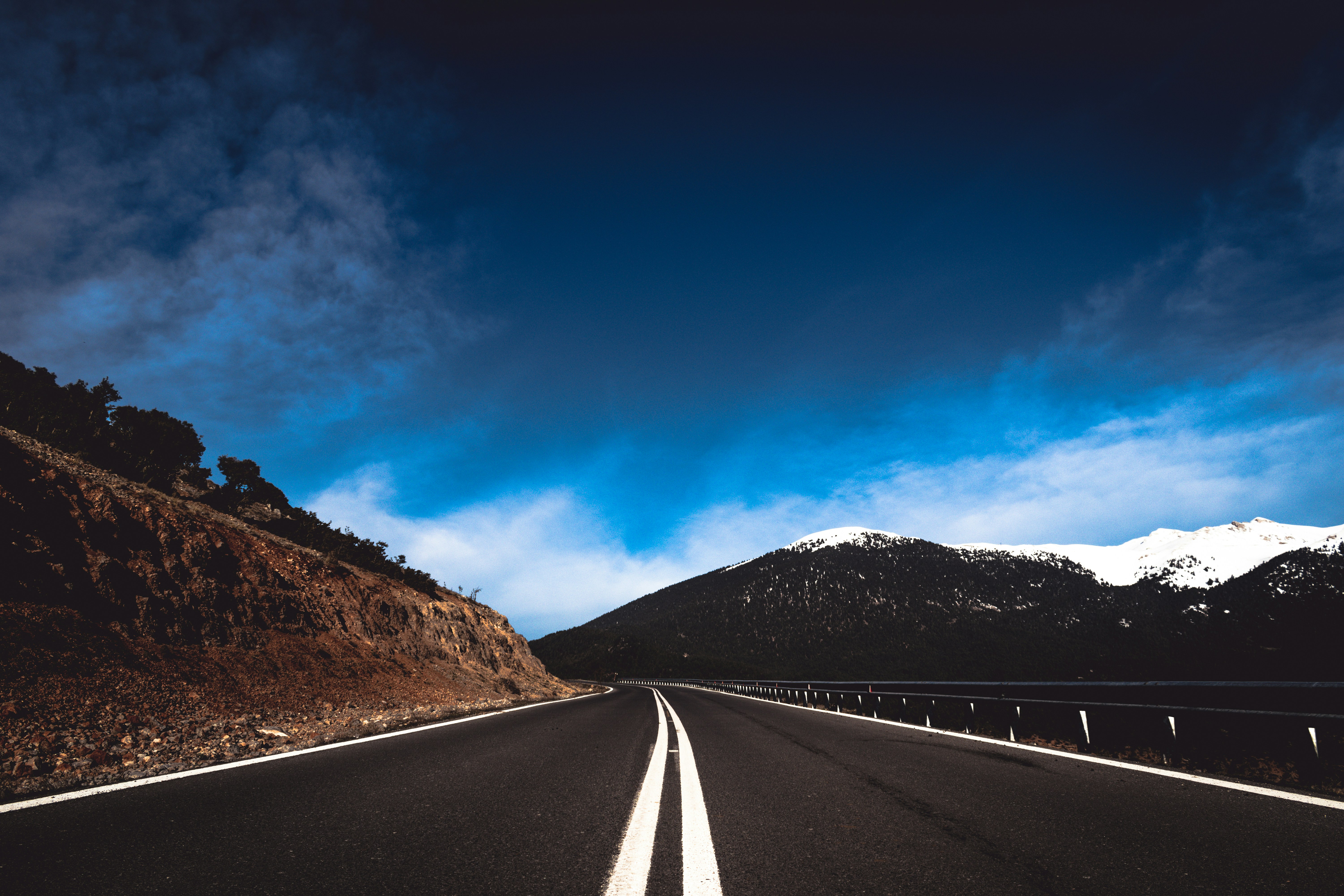 Mountain Highway Toward Snowy Mountains