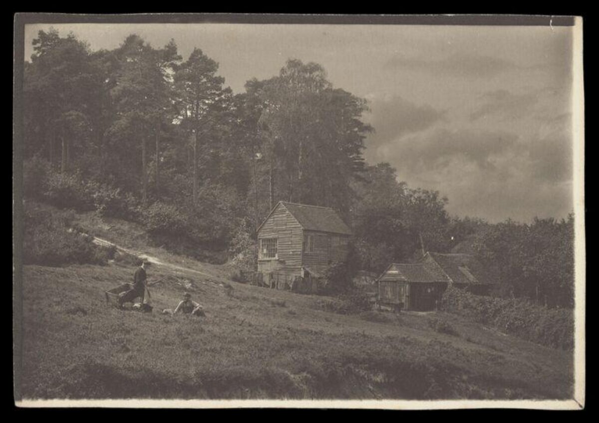 Vintage Photo of Hillside Workers and Wooden Huts