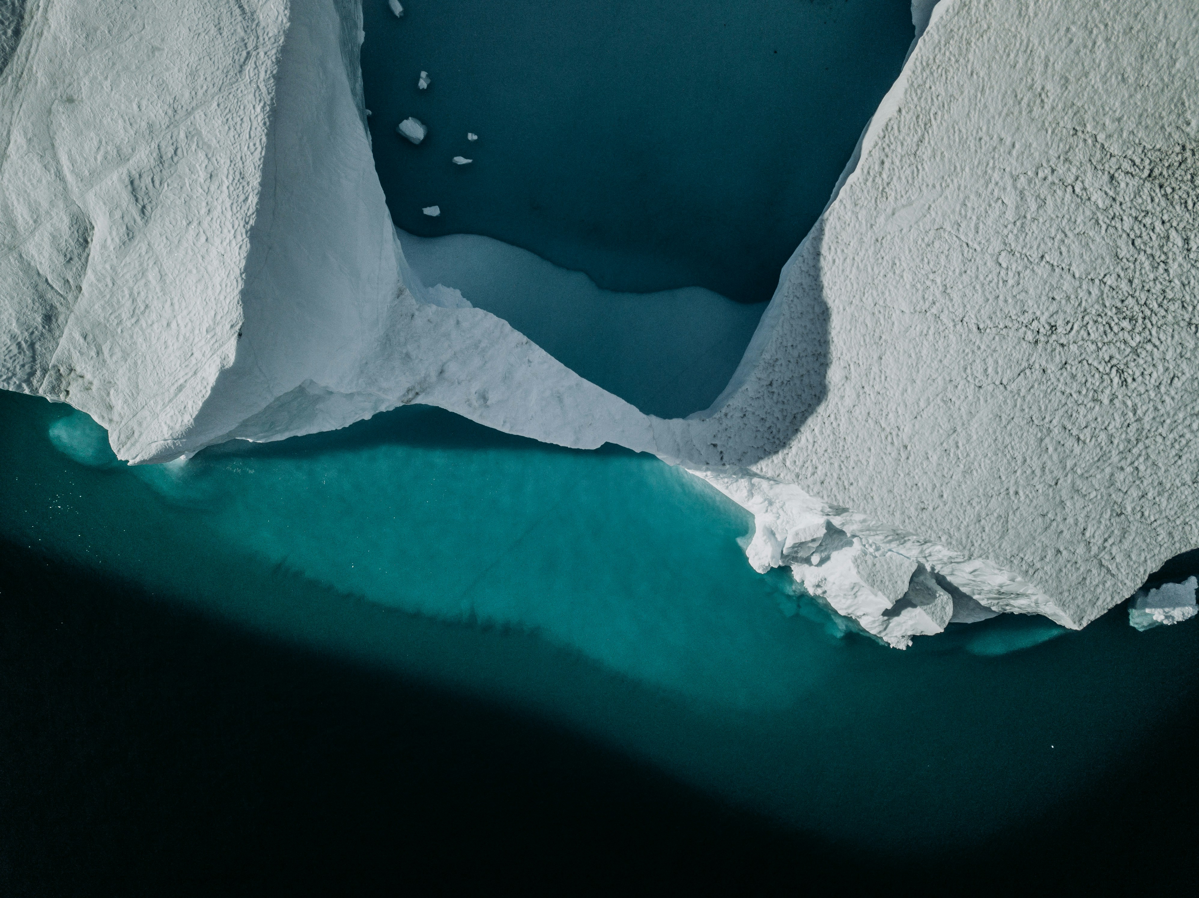 Arch Shaped Iceberg in Glacial Waters
