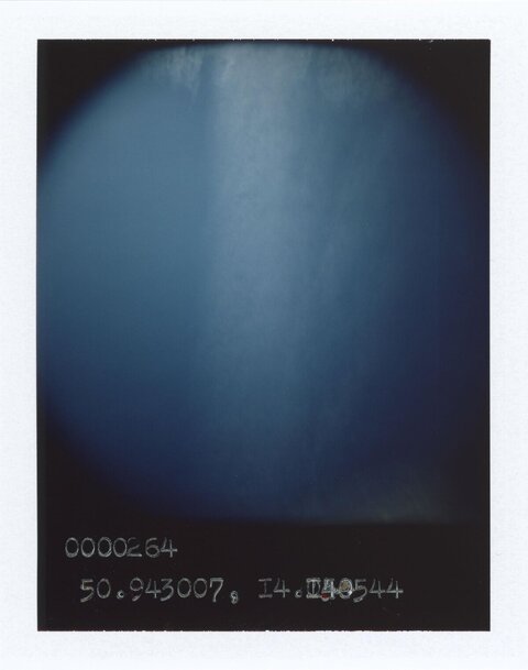 Polaroid Shot of Blue Overcast Sky