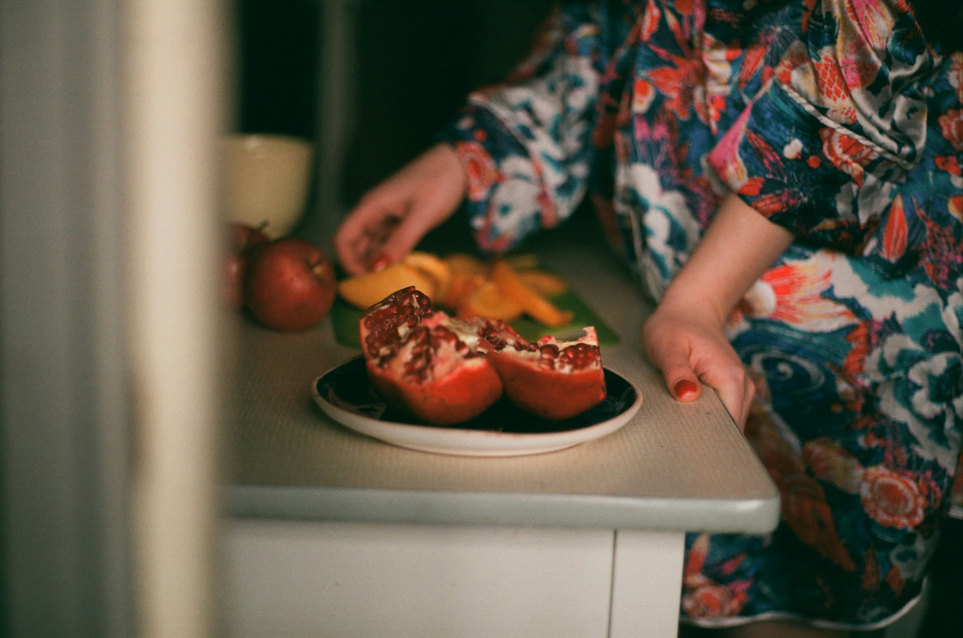 Preparing Fresh Fruits At Table