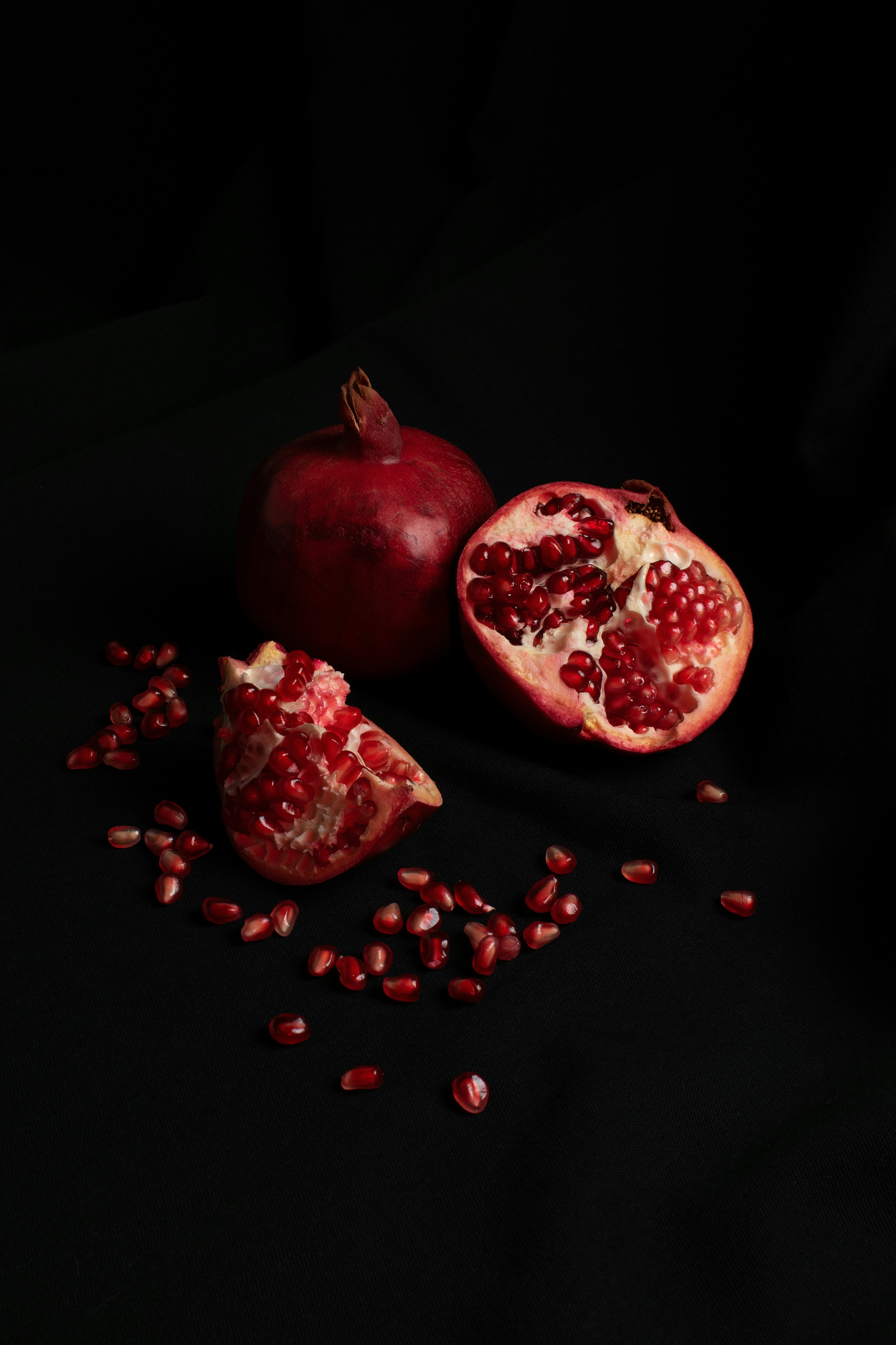 Pomegranate Still Life on Black Background