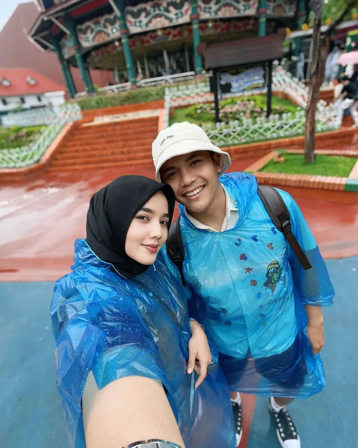 Rainy Day Couple Travel Selfie