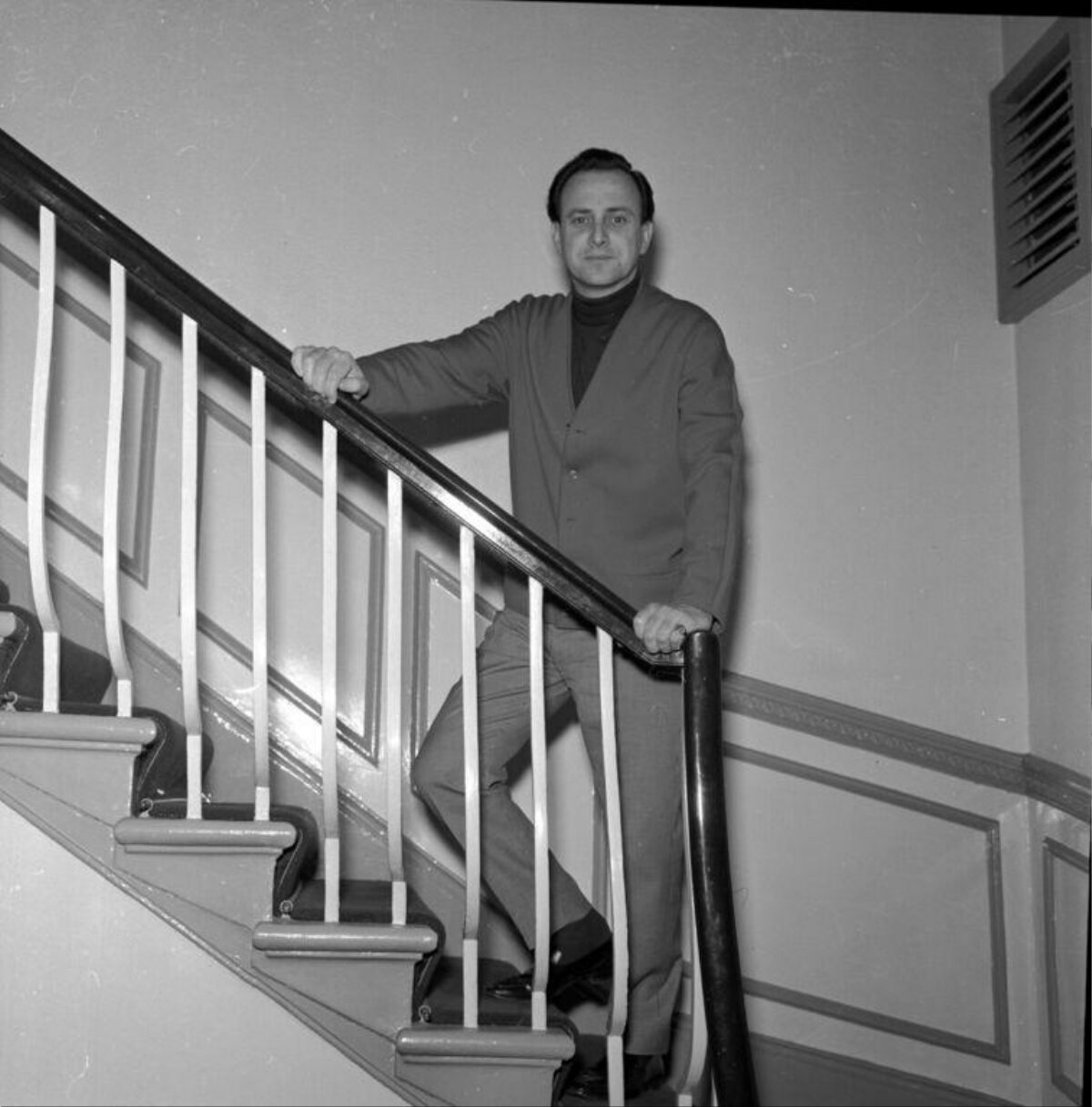 Man Standing on Indoor Staircase