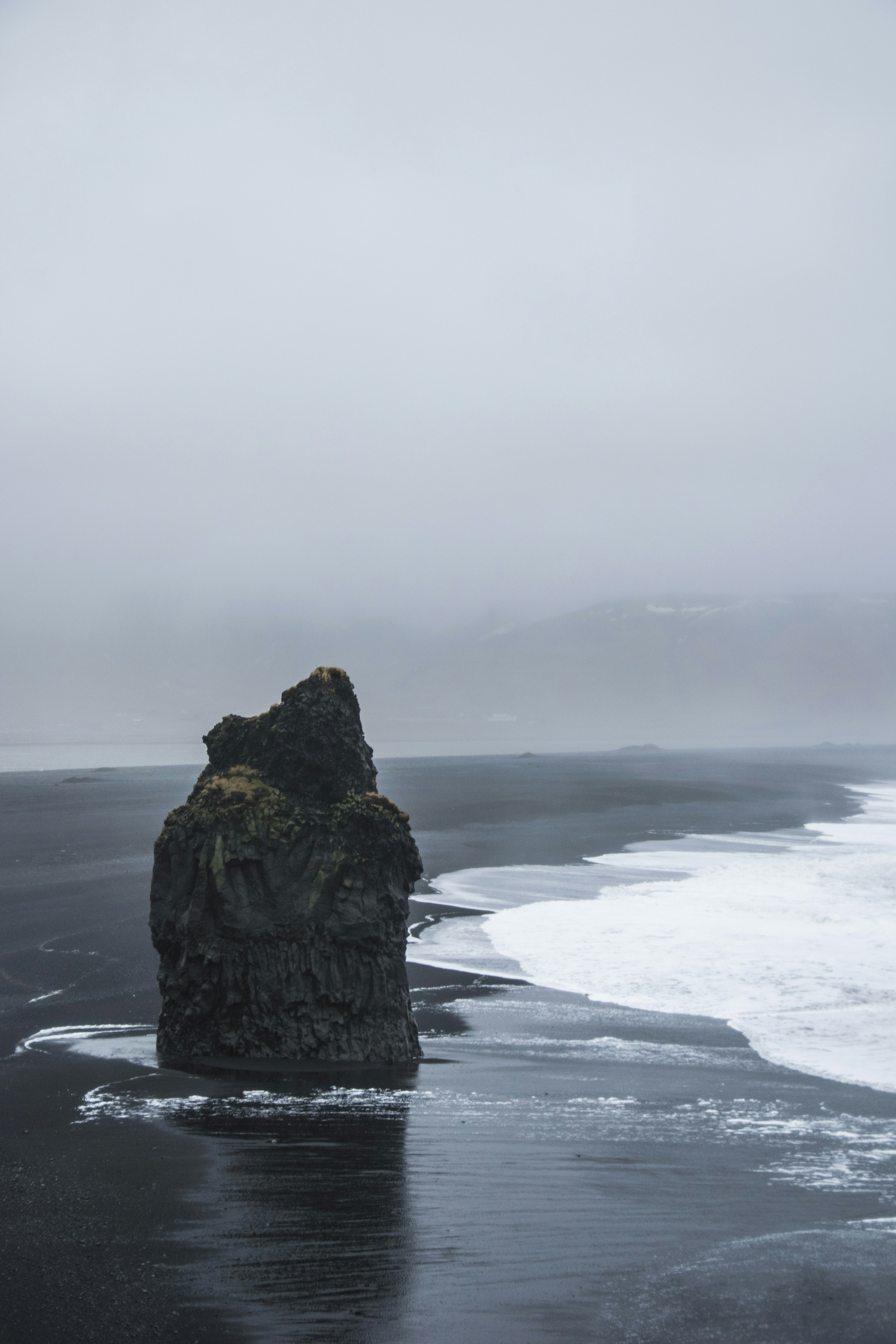 Foggy Black Sand Beach Sea Stack
