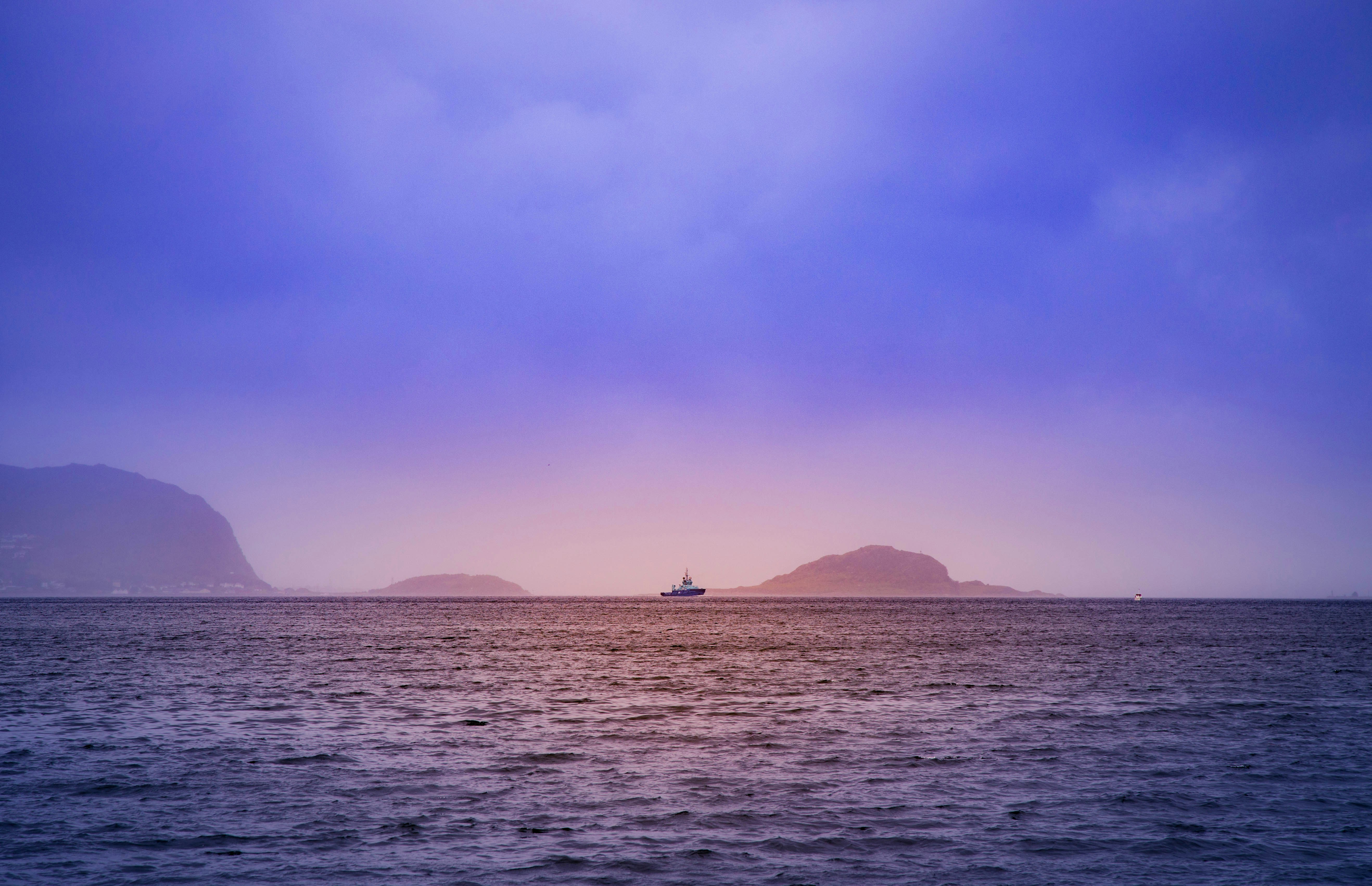 Dusk Sea View with Distant Ship