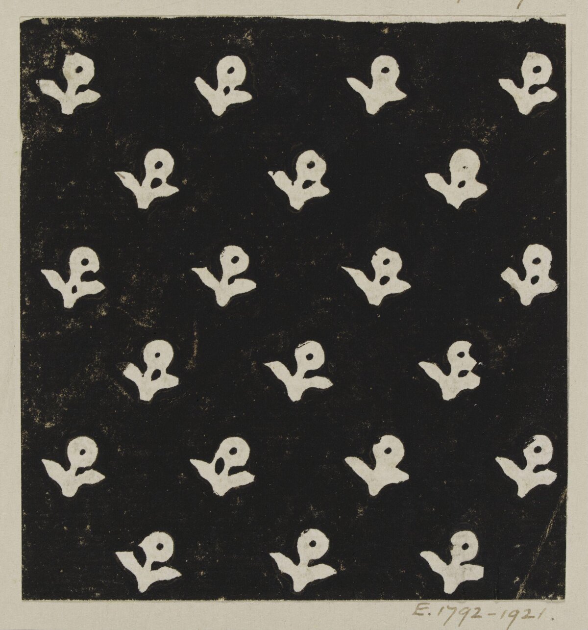 Repeated Stylized Flower Pattern Print