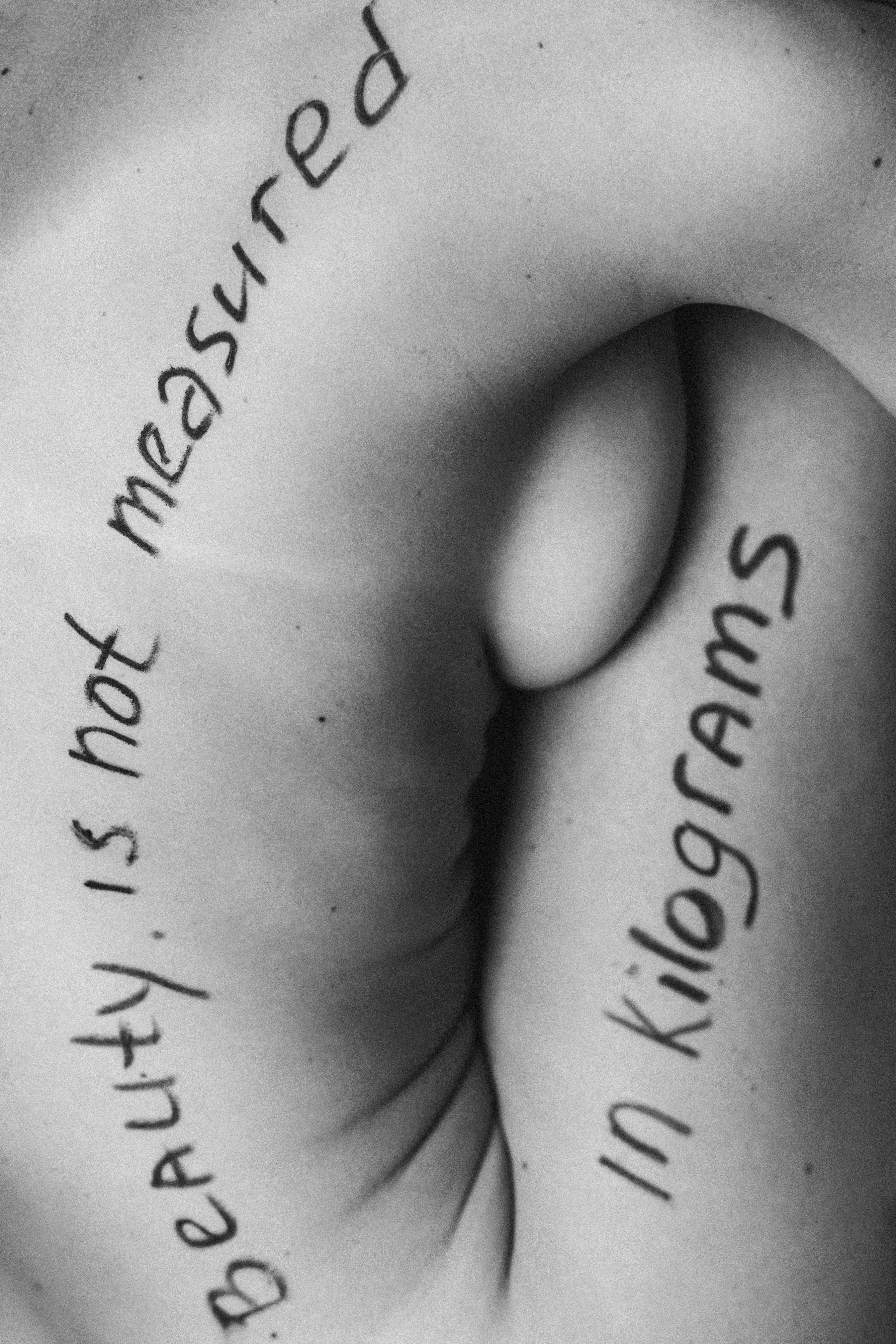 Body Positive Message on Human Skin