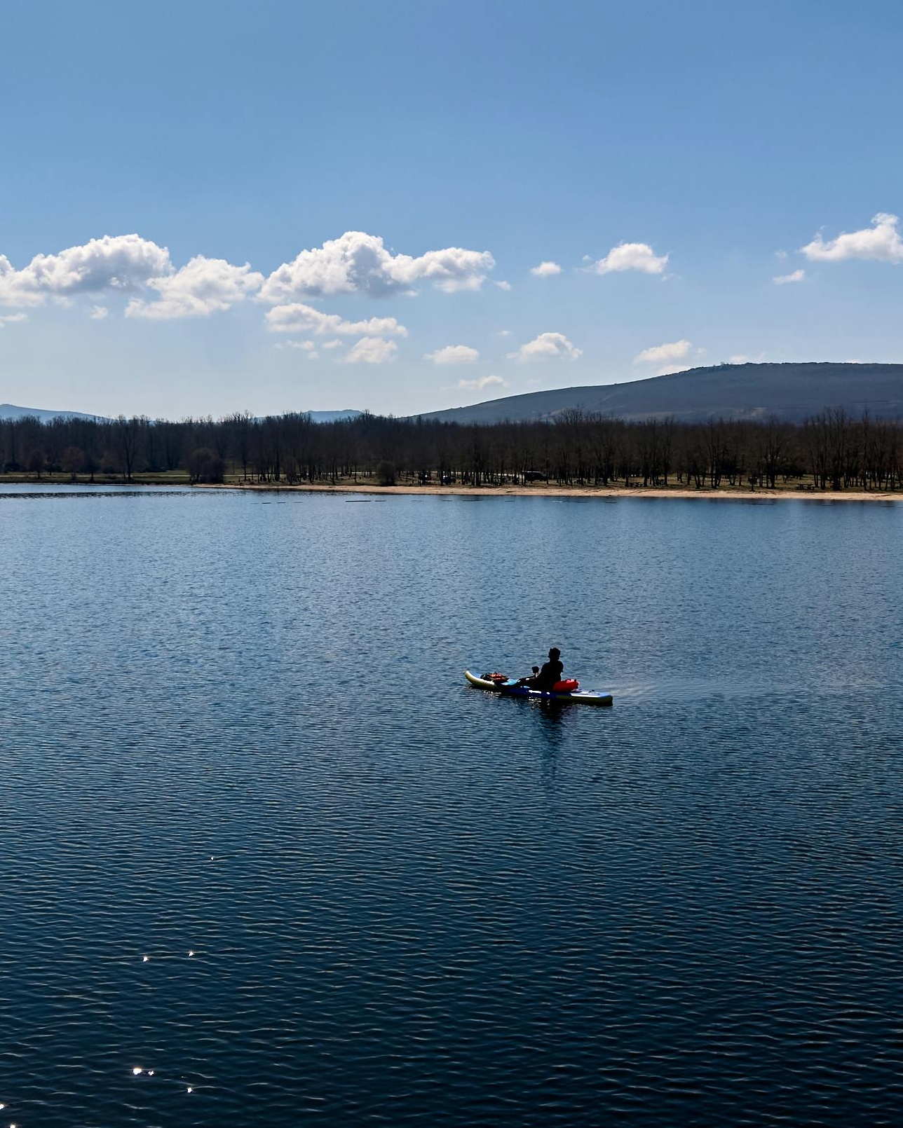 Kayaker on a Calm Lake