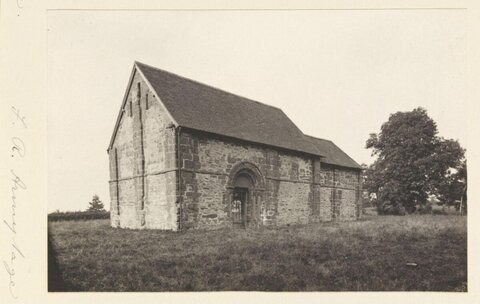 Old Stone Chapel in Grassy Field