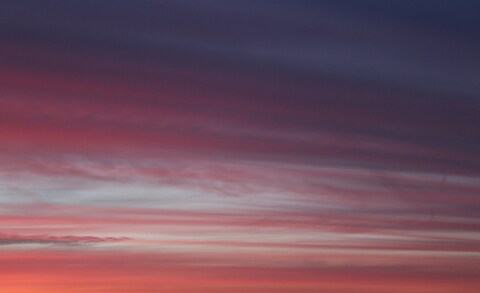 Sunset Sky with Layered Clouds