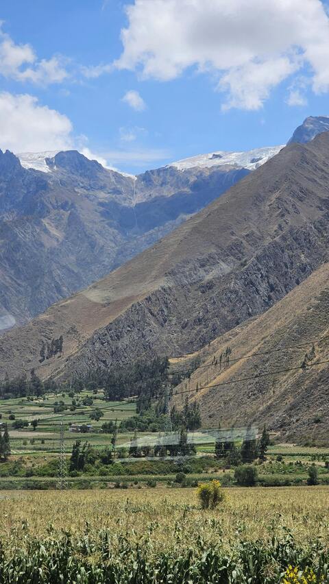 Snow-capped Mountain Valley Farmland
