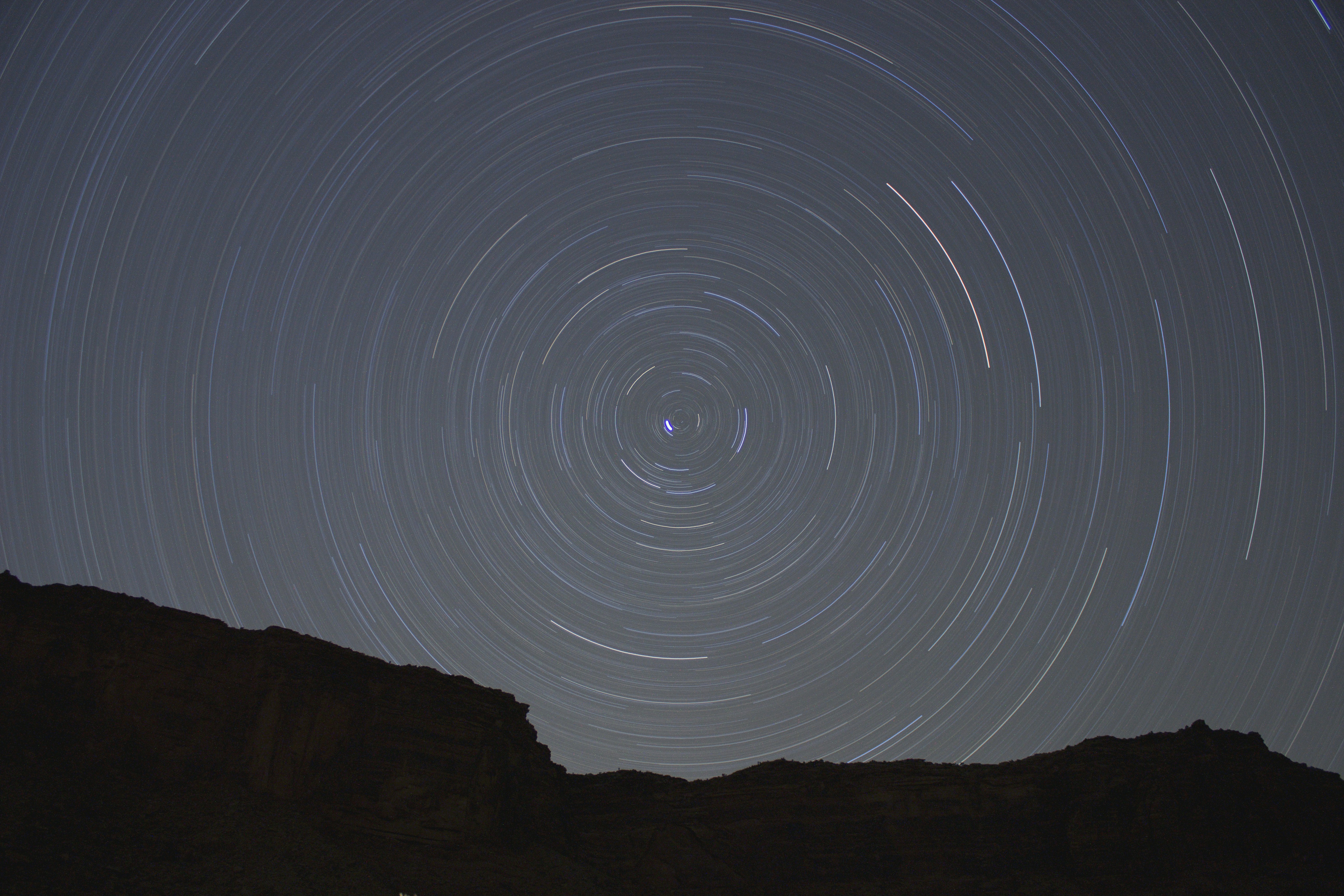 Star Trails Over Rocky Cliffs