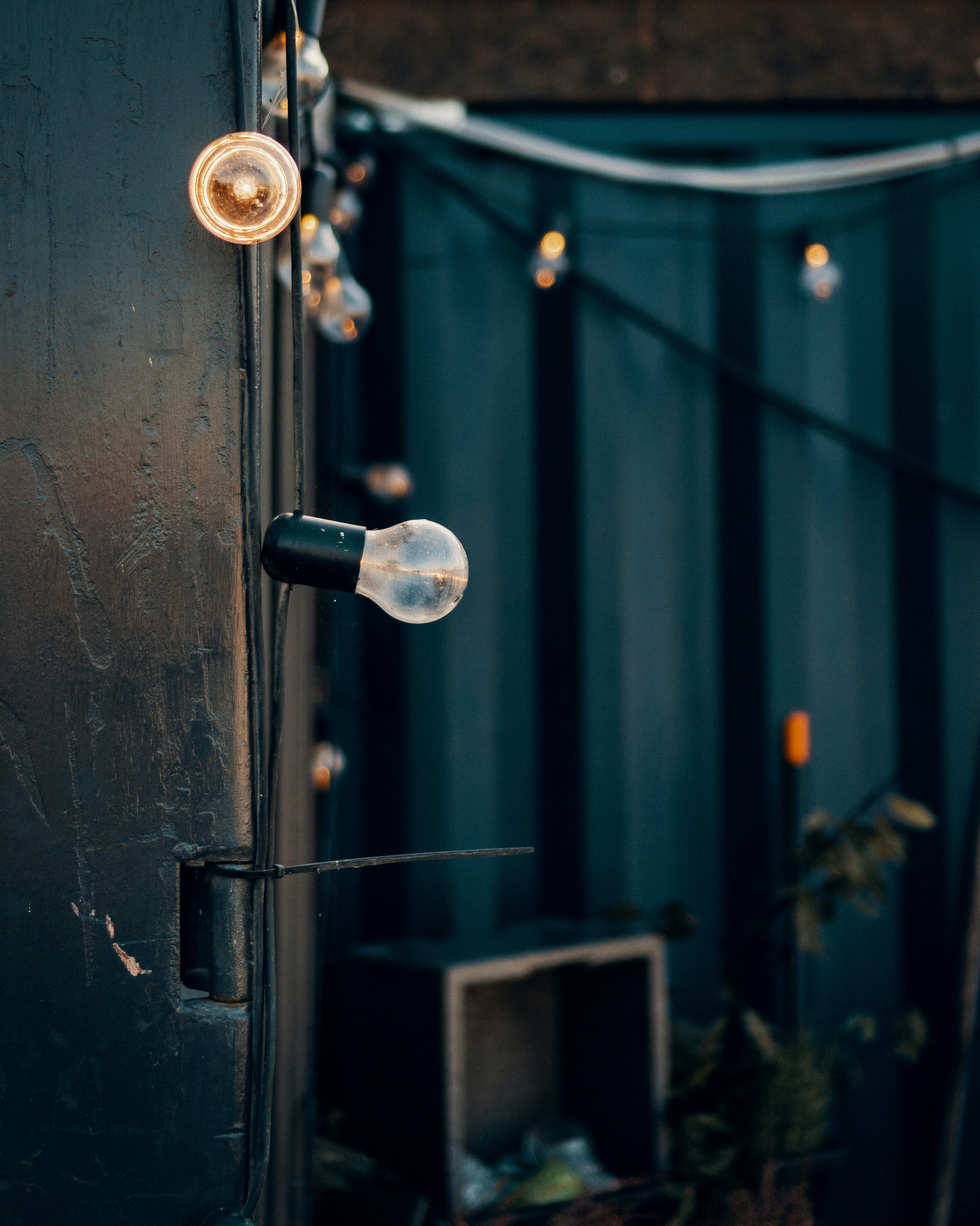String Lights on Dark Industrial Wall