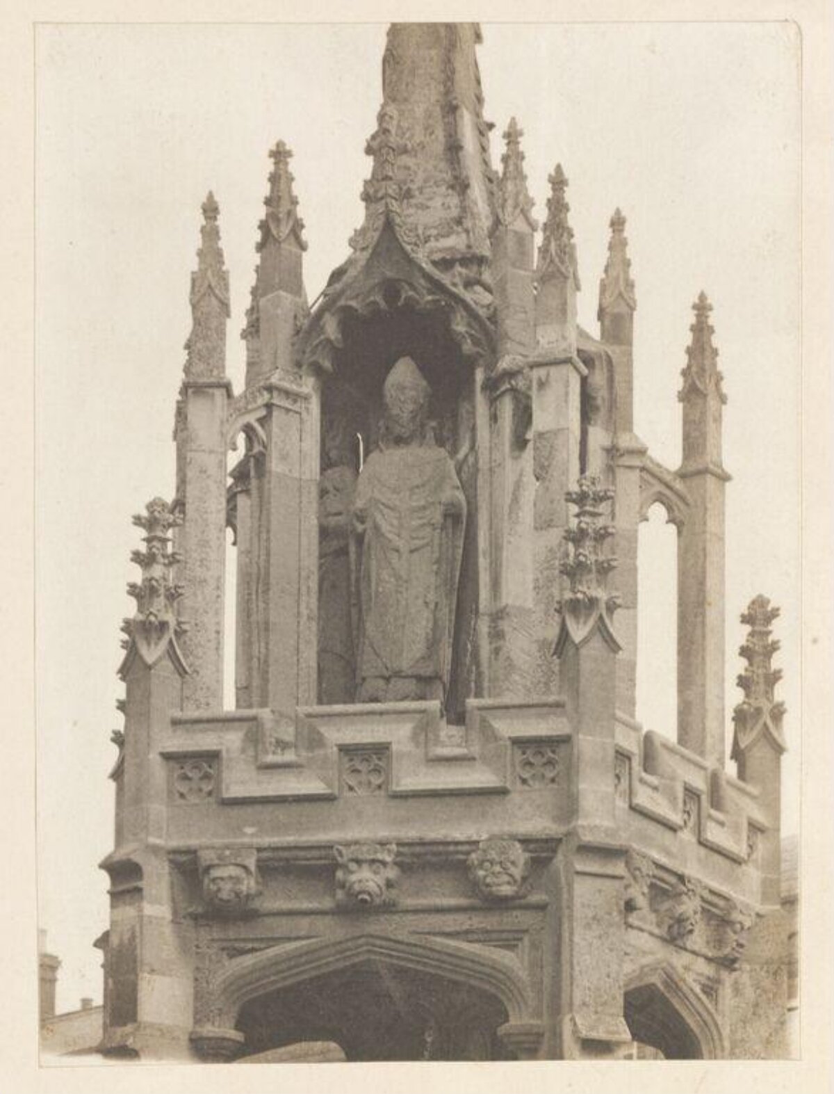 Gothic Stone Monument with Bishop Statue