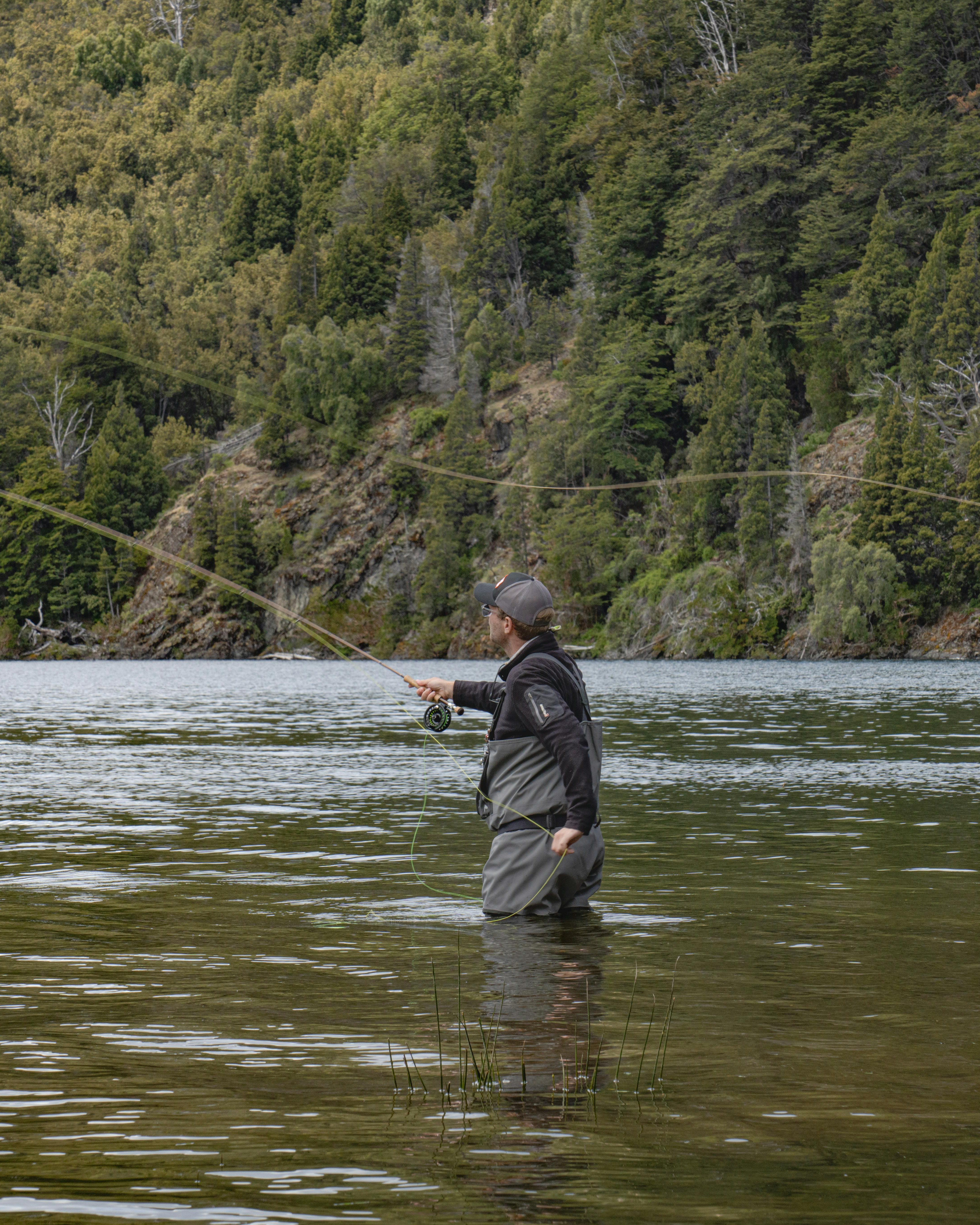 Man Fly Fishing in River