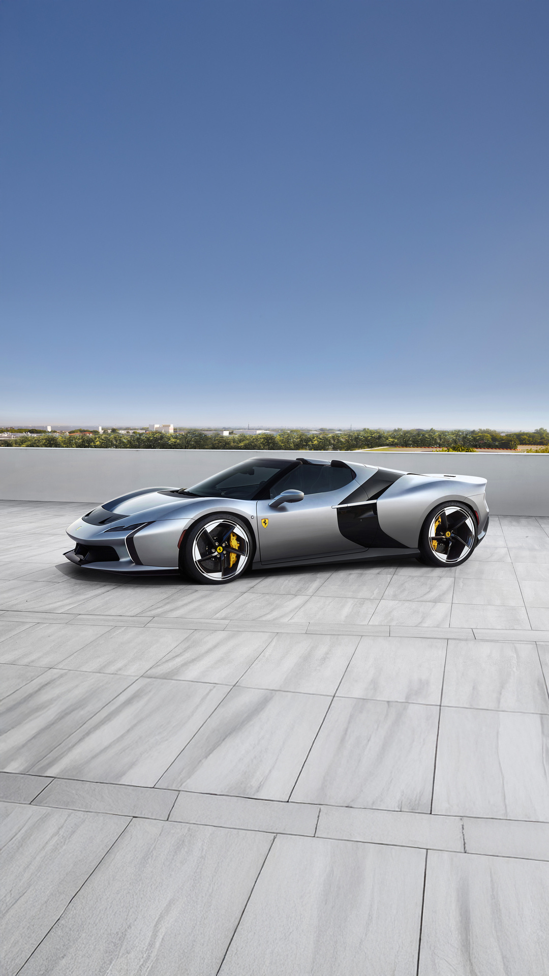 Silver Ferrari Convertible on Rooftop