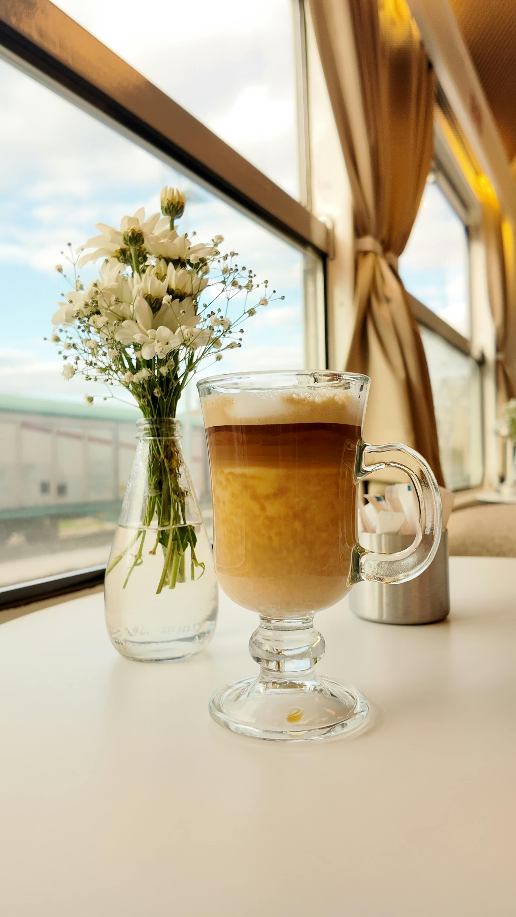 Layered Coffee by Train Window