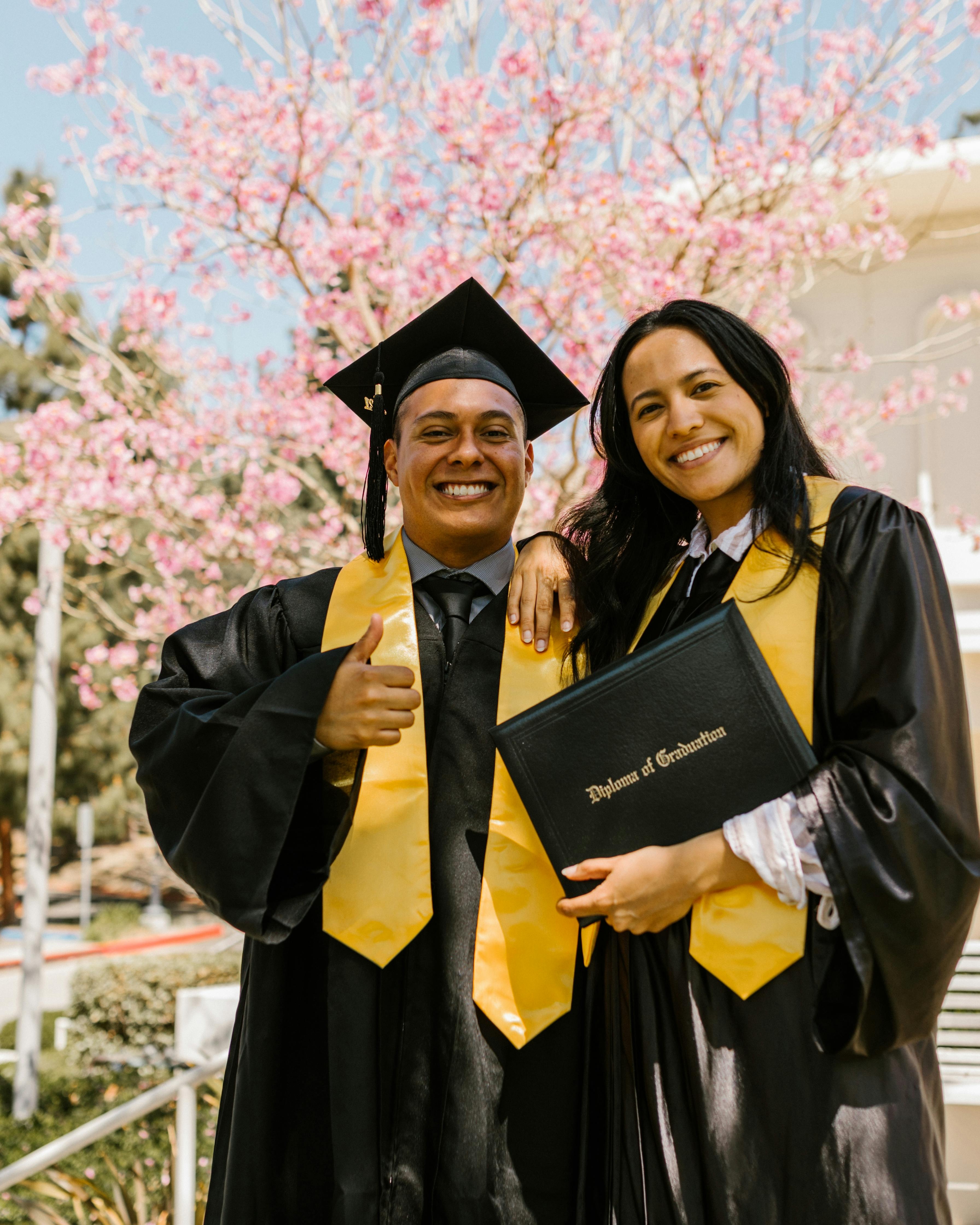 Two Happy Graduates on Graduation Day