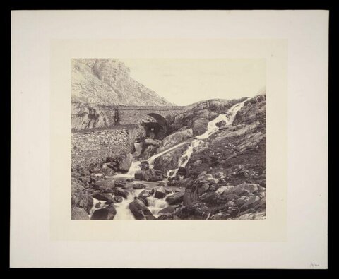Vintage Stone Bridge Over Mountain Waterfall