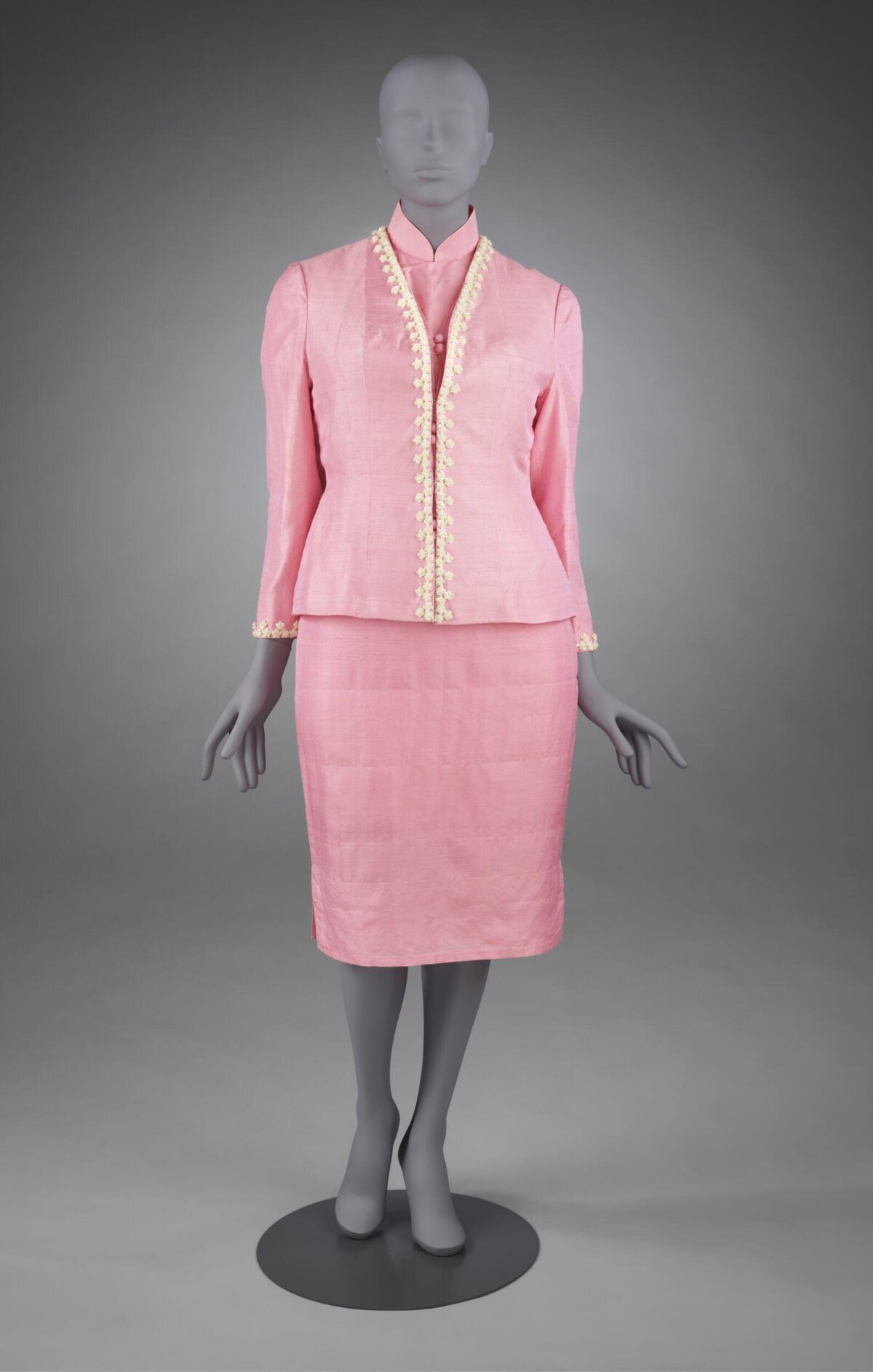 Pink Two-Piece Suit on Display Mannequin