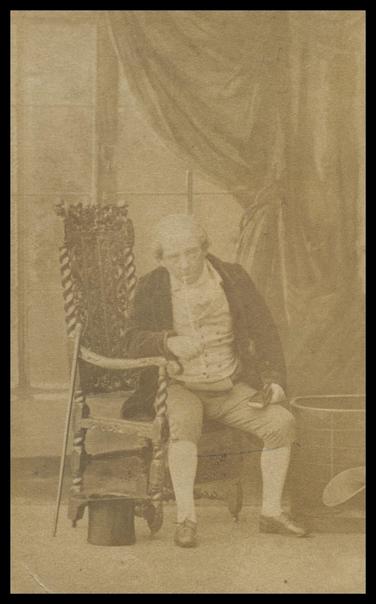 Vintage Portrait of Seated Man in Armchair