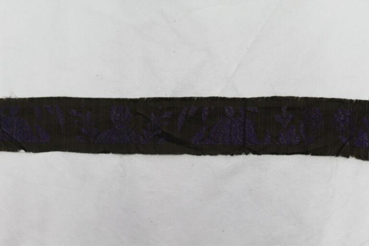 Ancient Purple Patterned Textile Fragment
