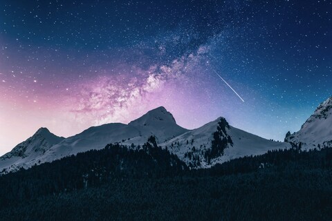 Starry Sky Over Snowy Mountains