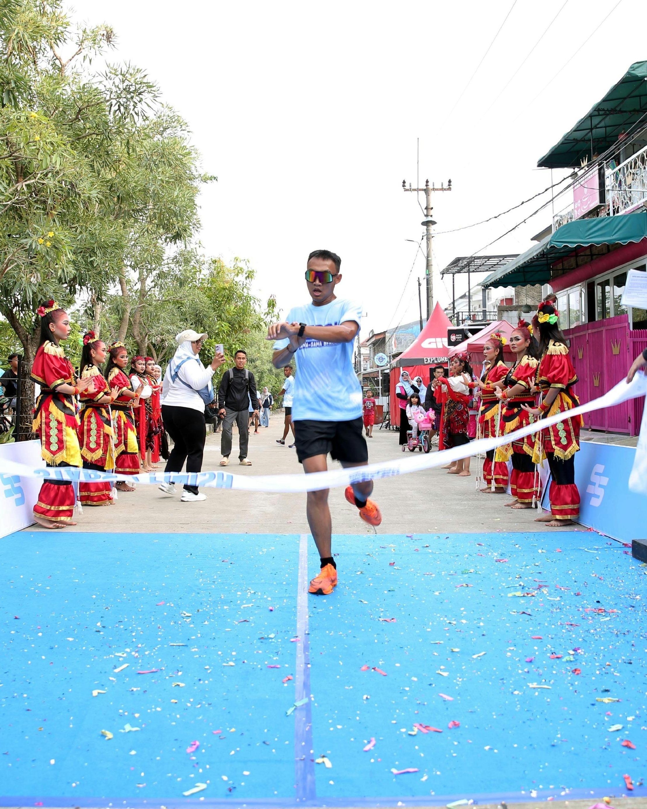 Runner Crossing Marathon Finish Line