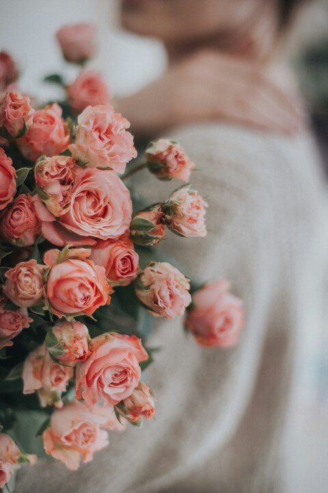 Woman Holding Pink Rose Bouquet
