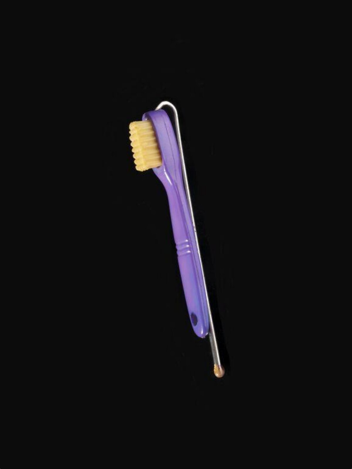 Purple Toothbrush on Black Background