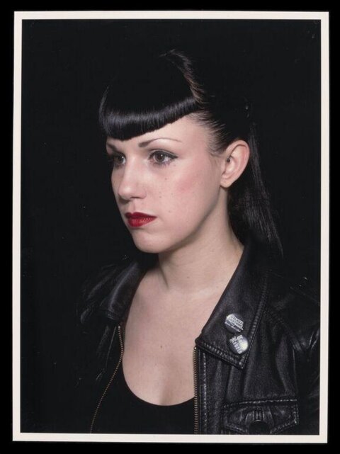 Portrait of Woman in Black Leather Jacket