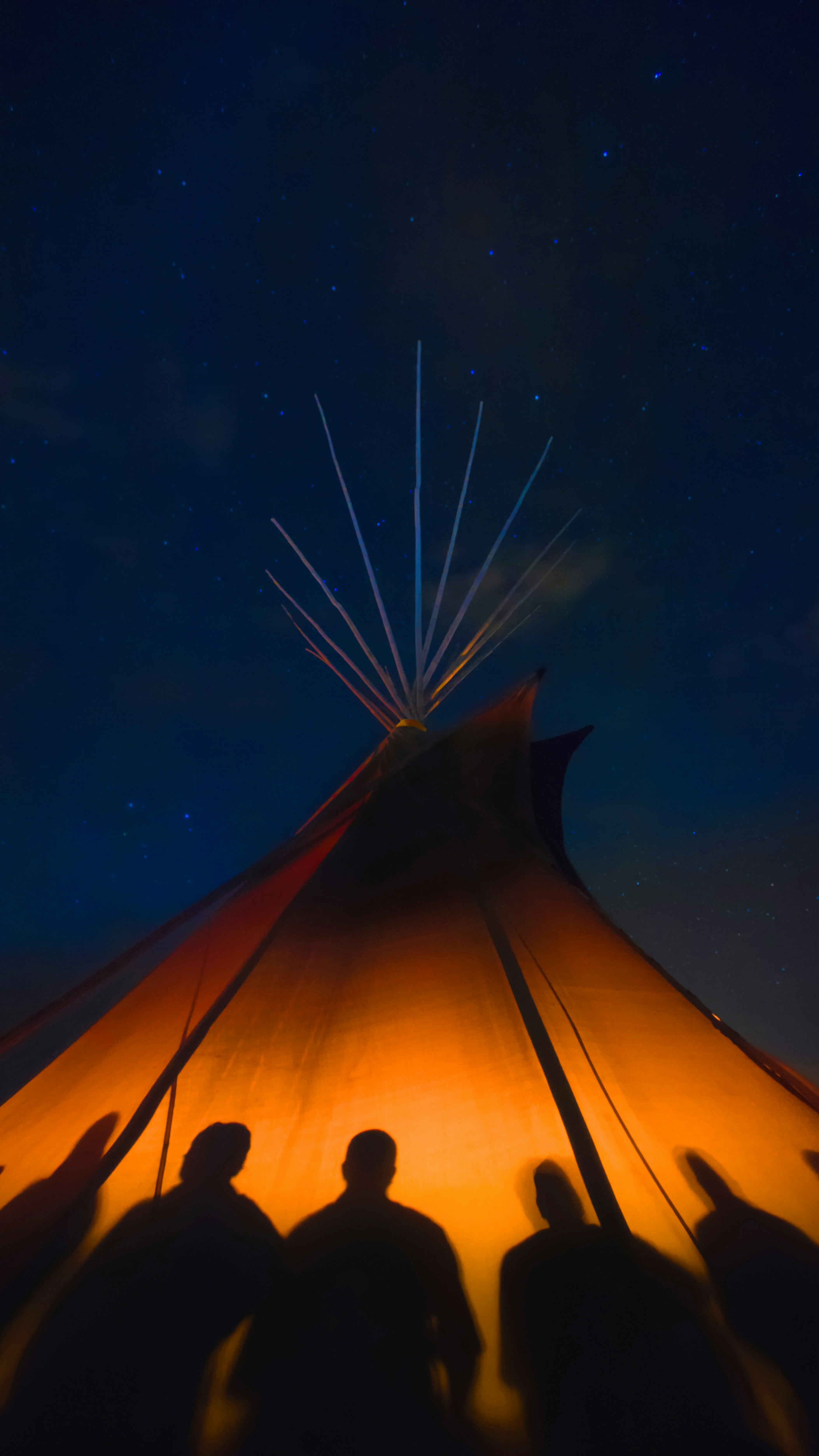 Tipi Under Starry Night With People Silhouettes — Phone Wallpapers