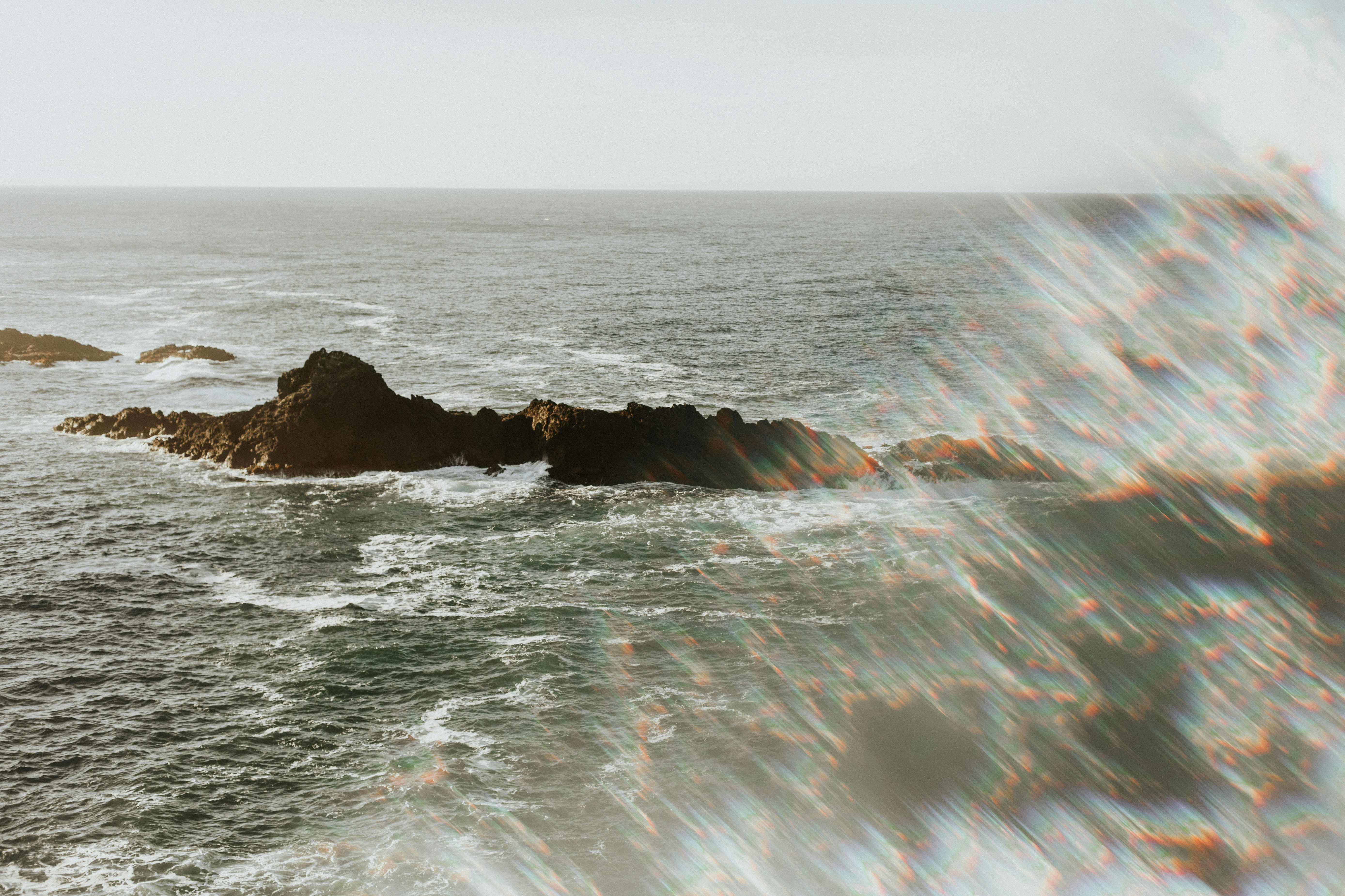 Ocean Rocks with Sun Flare