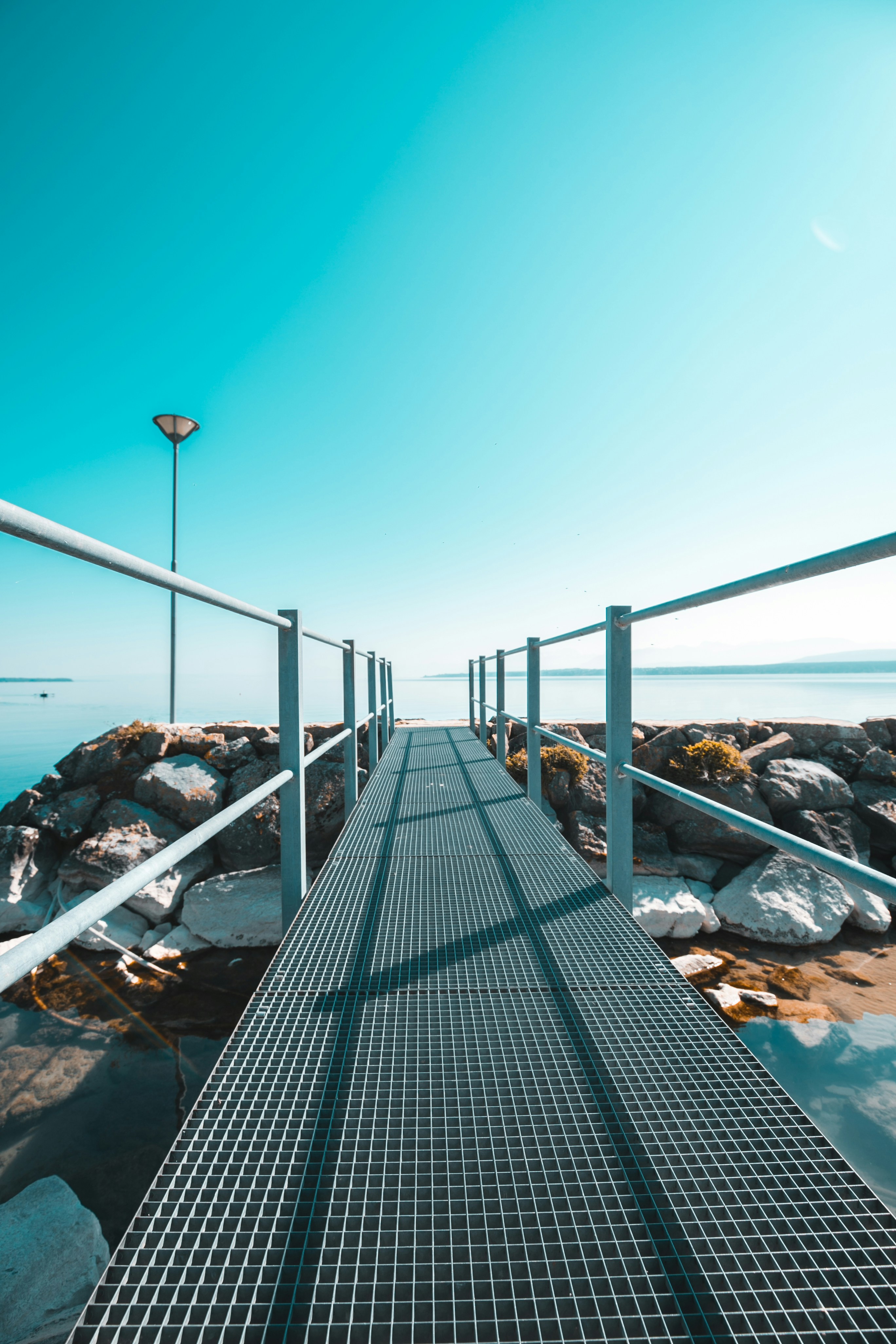 Pier Walkway Leading to Calm Lake