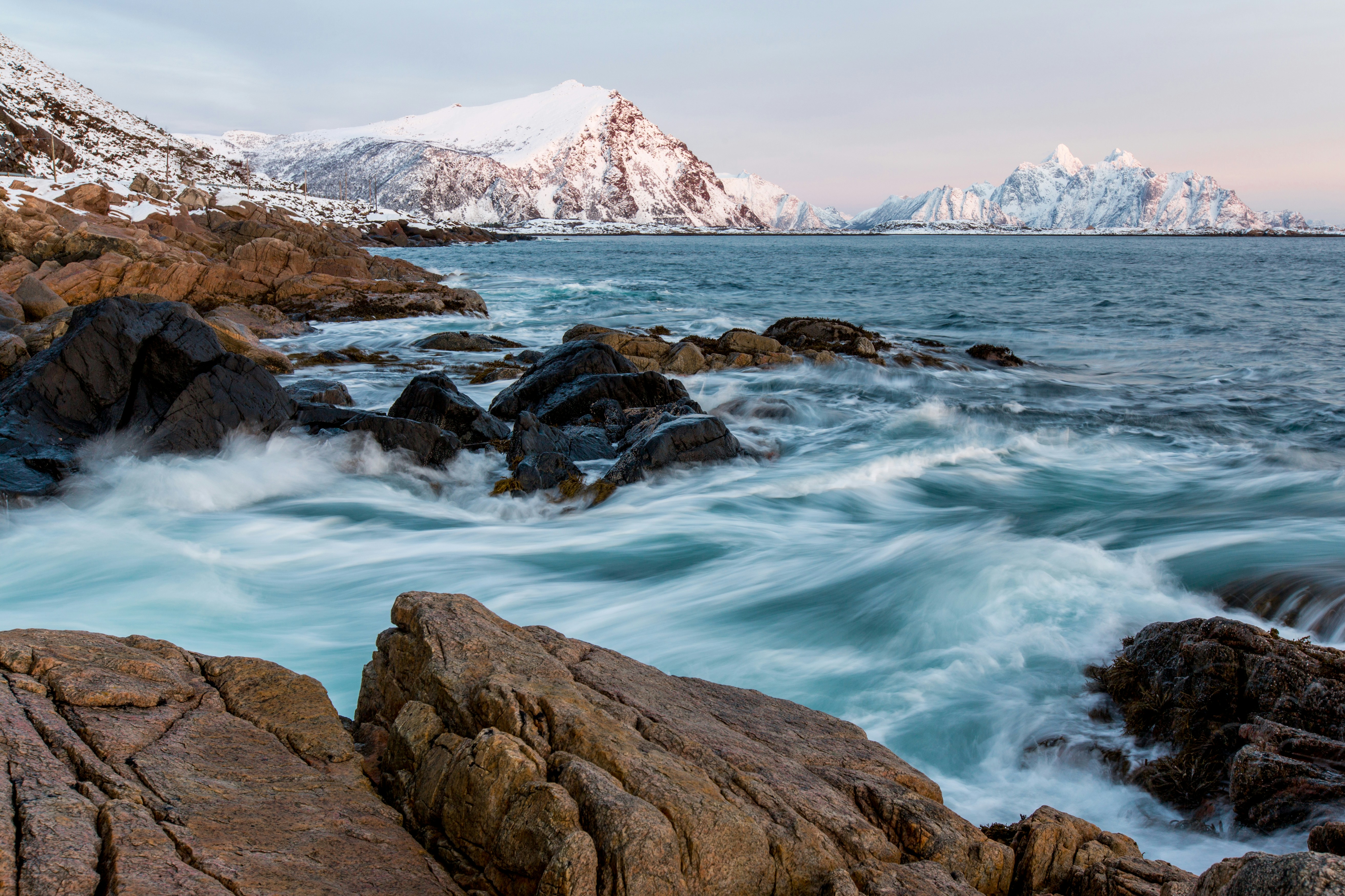 Snowy Coastal Mountain Seascape