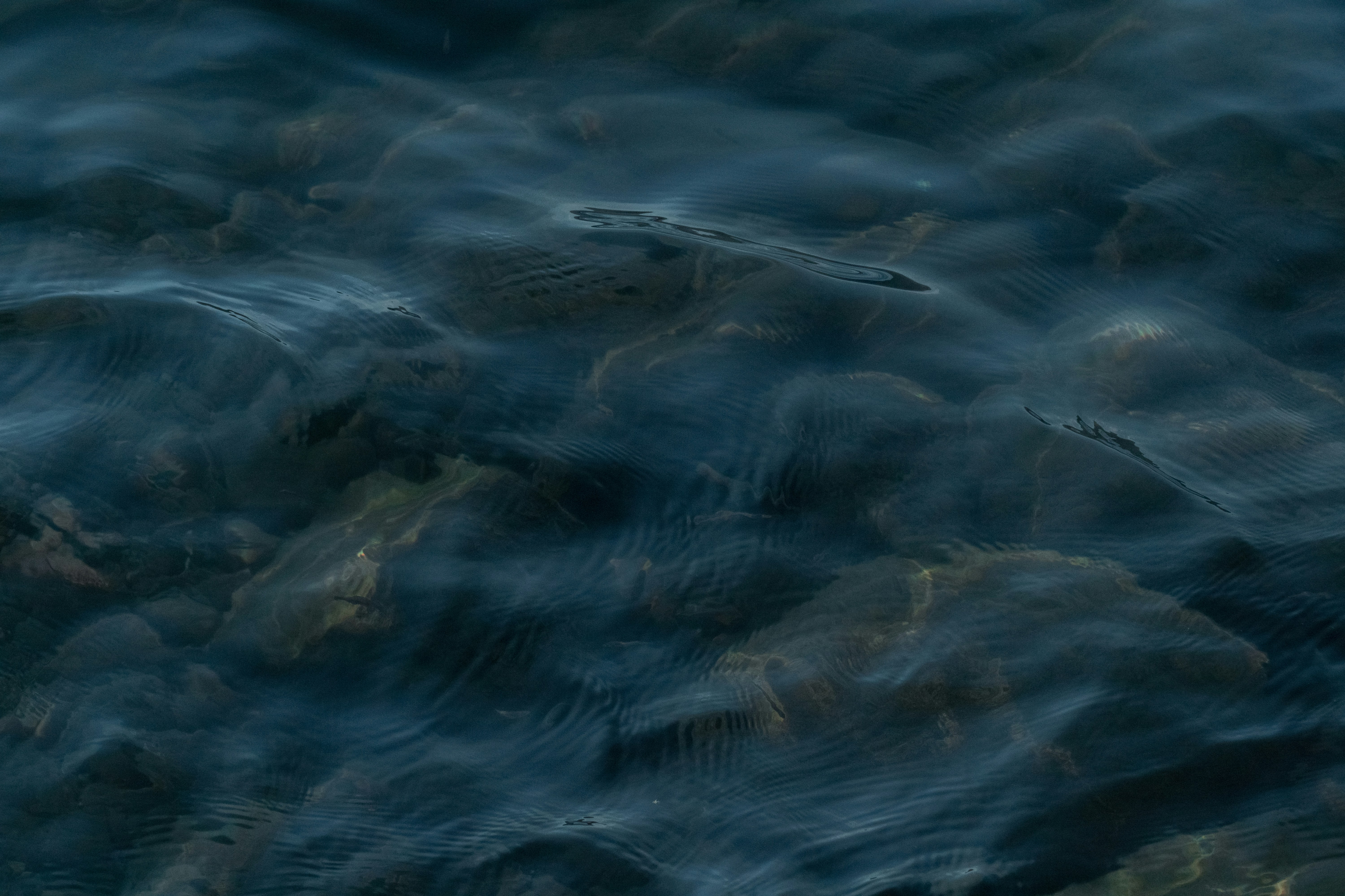 Rippled Clear Water Over Rocks