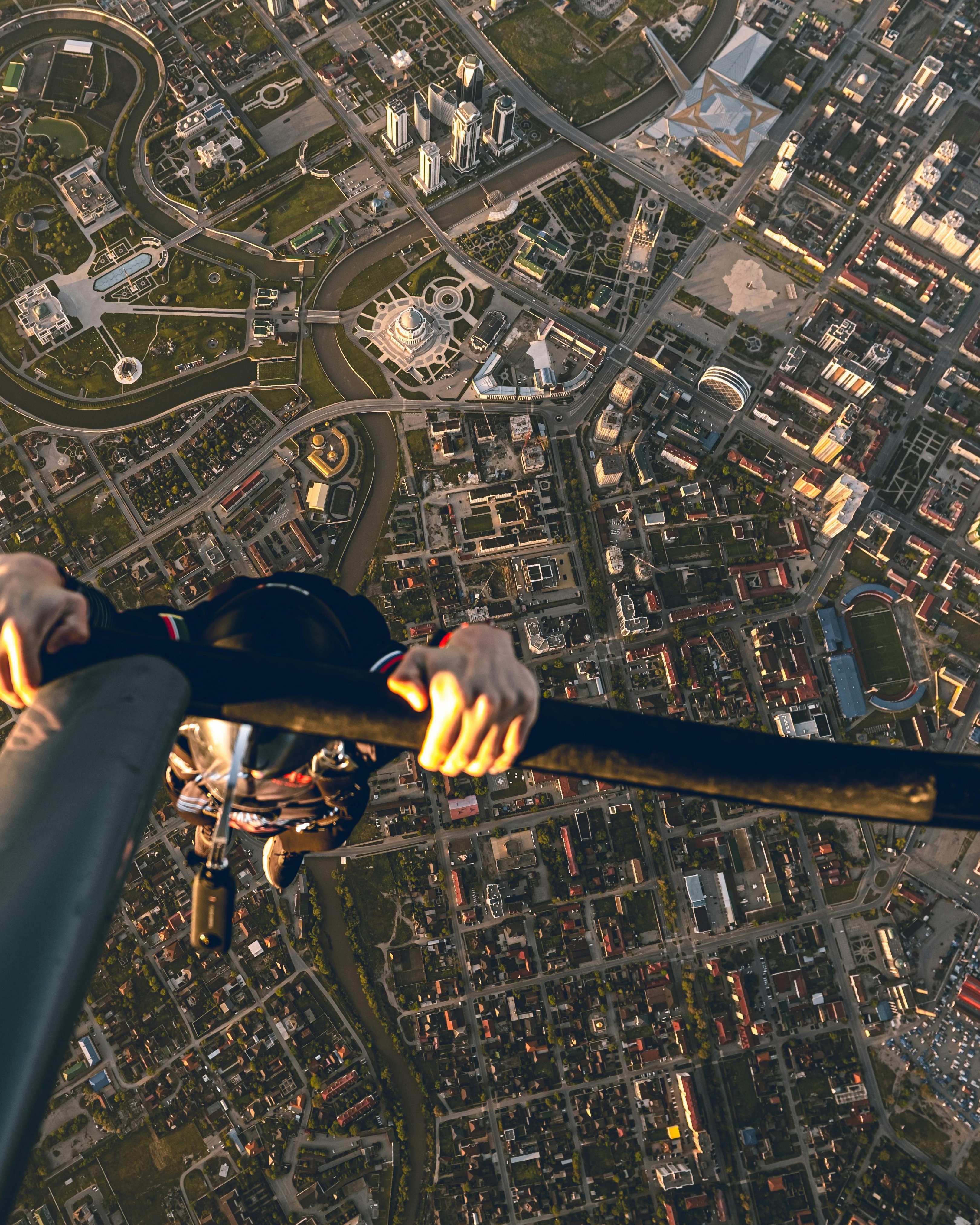 First Person Skydiving Over City