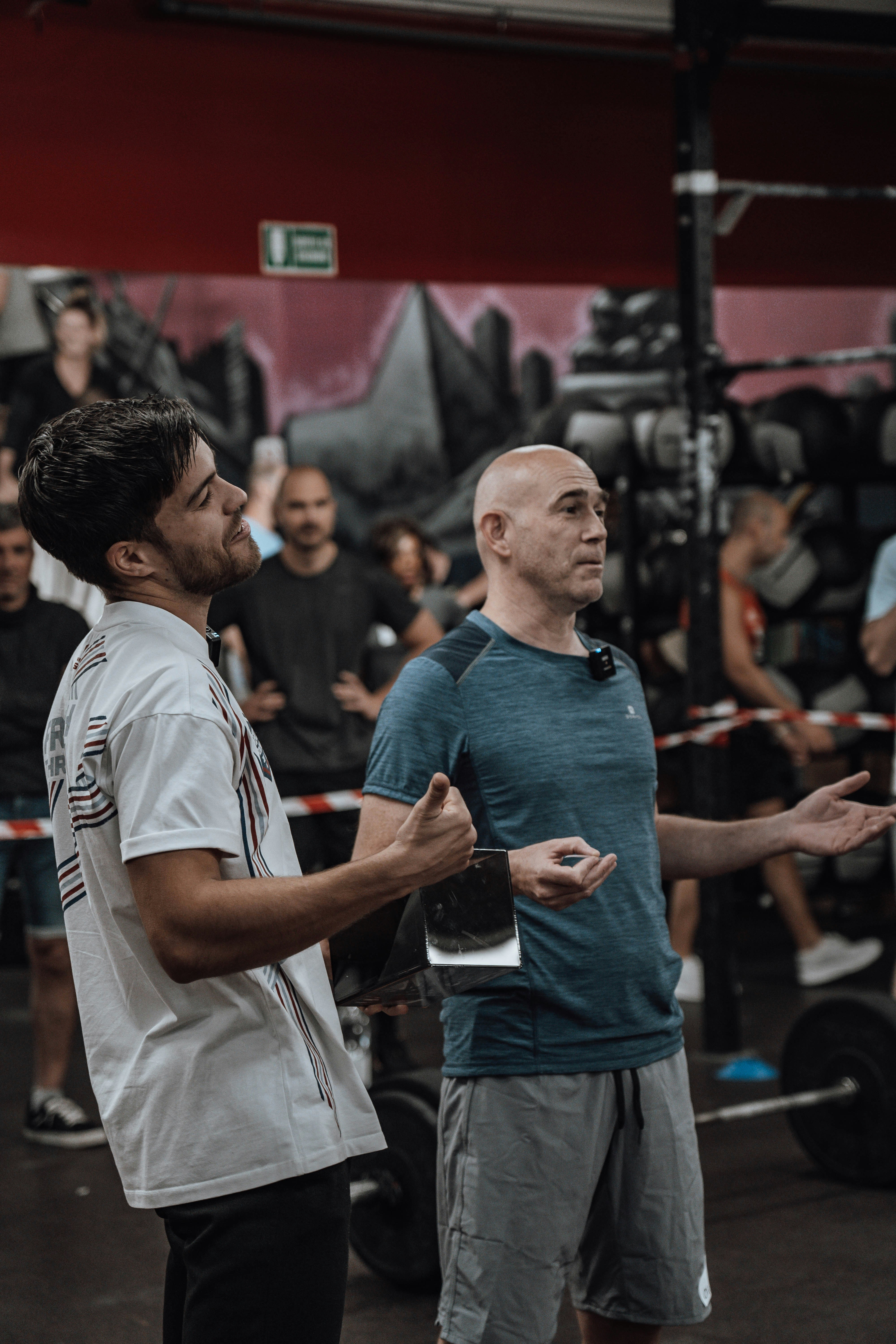Two Men at Indoor Gym Event