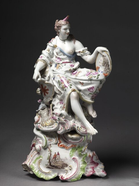 Painted Porcelain Seated Woman Figurine