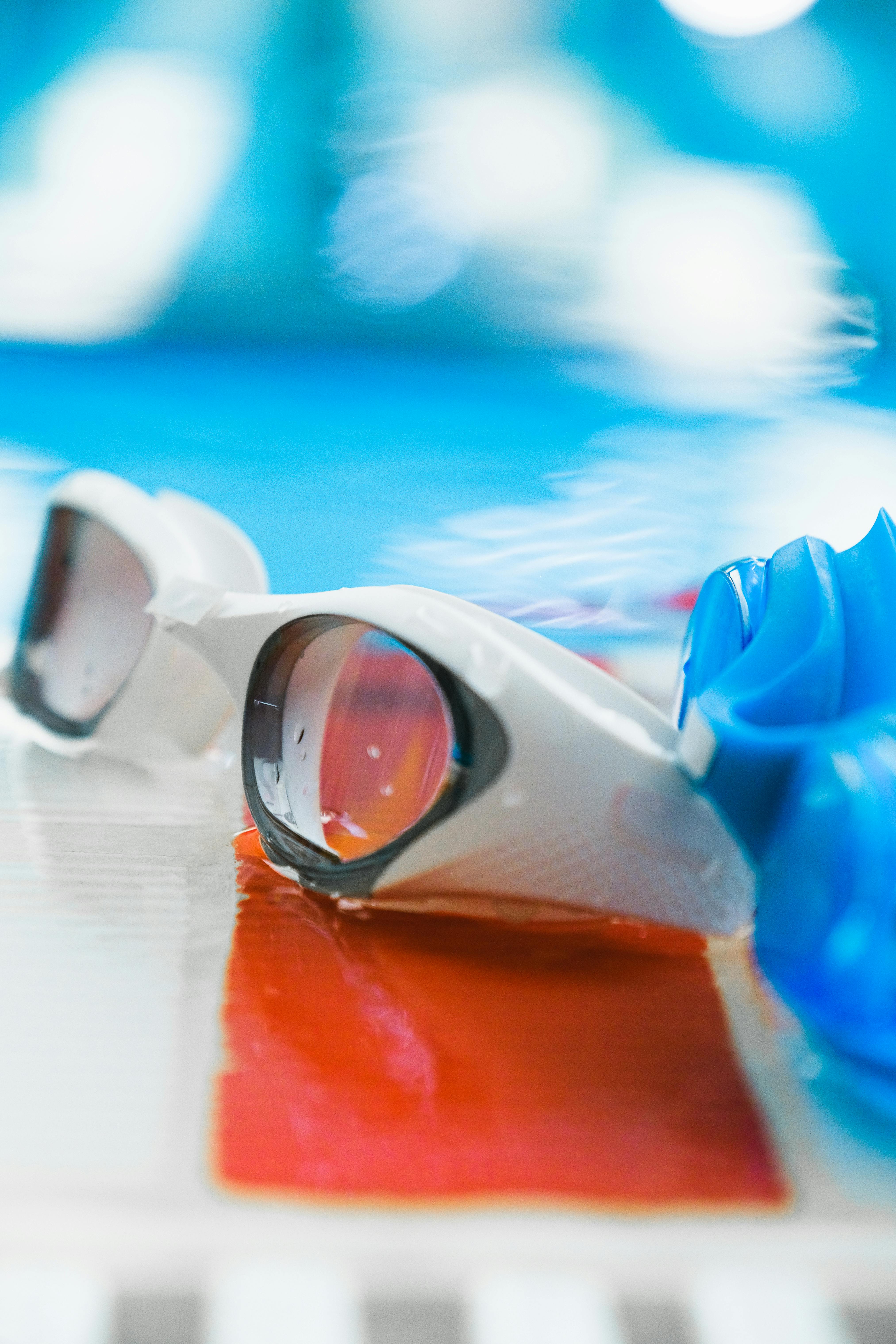 Swimming Goggles and Cap at Poolside