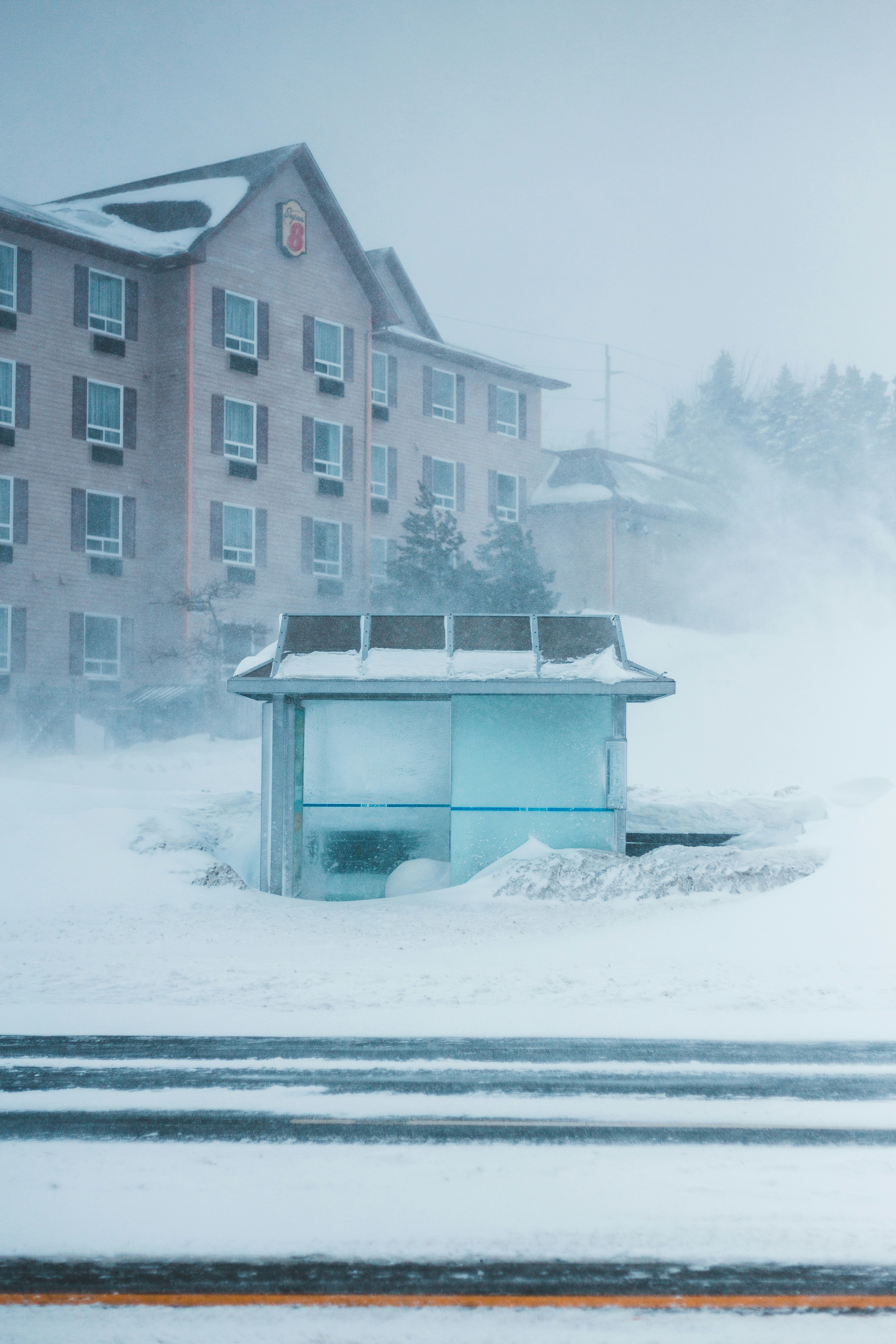 Blizzard-Covered Roadside Hotel