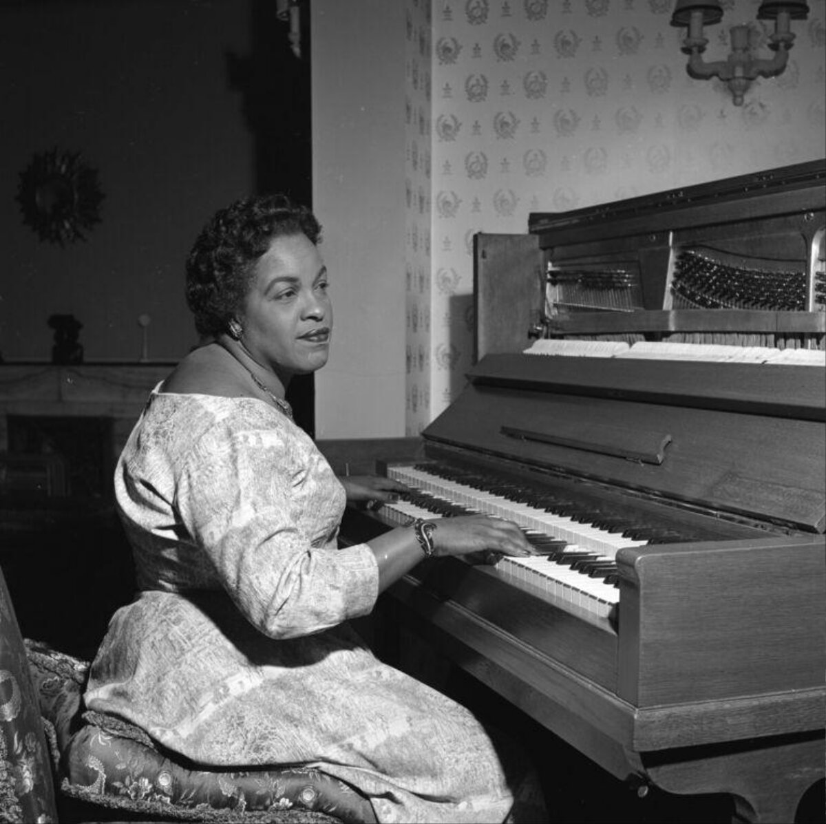 Woman Playing Piano at Home