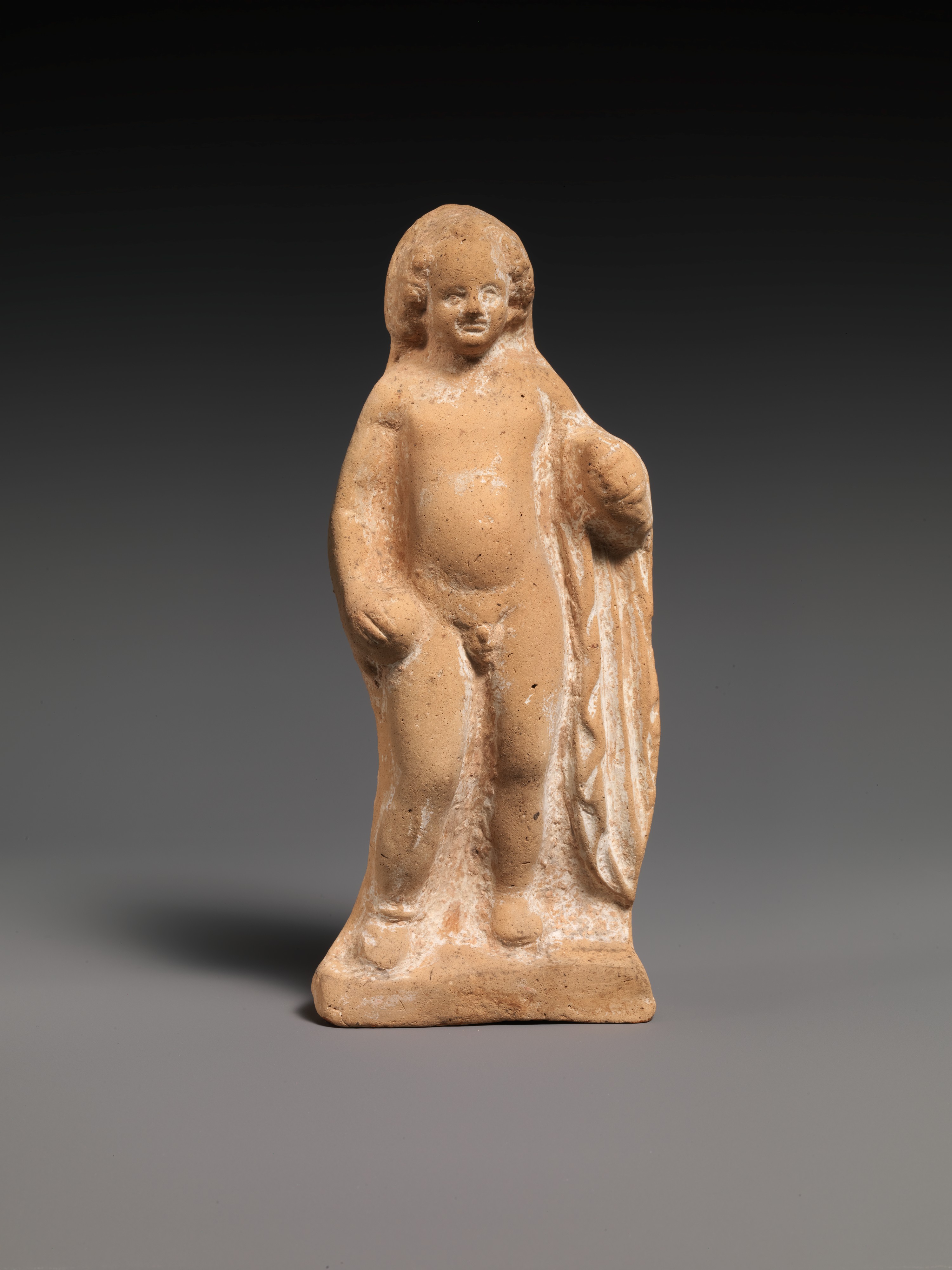 Ancient Terracotta Boy Statuette