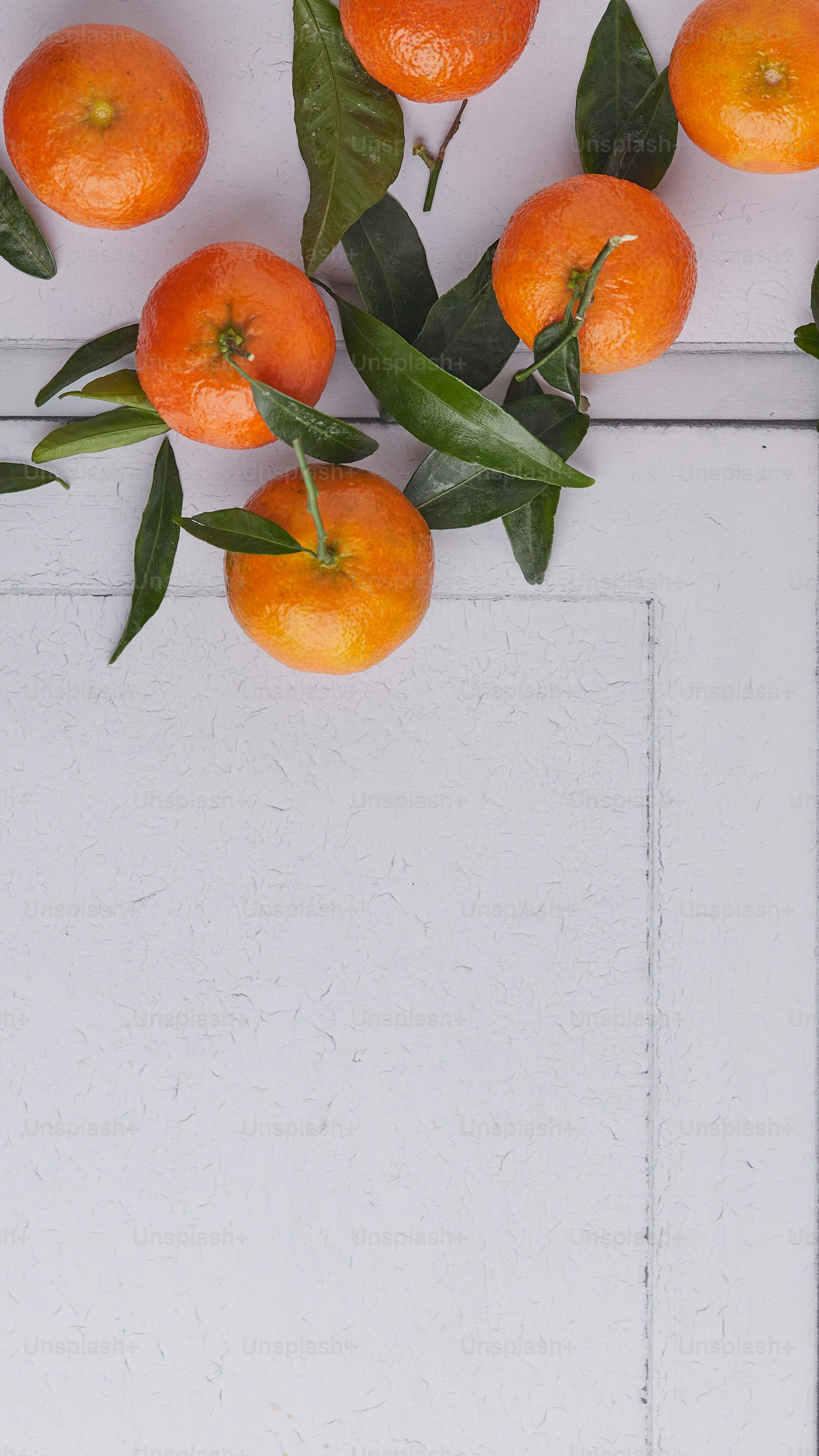 Fresh Tangerines on White Wooden Surface