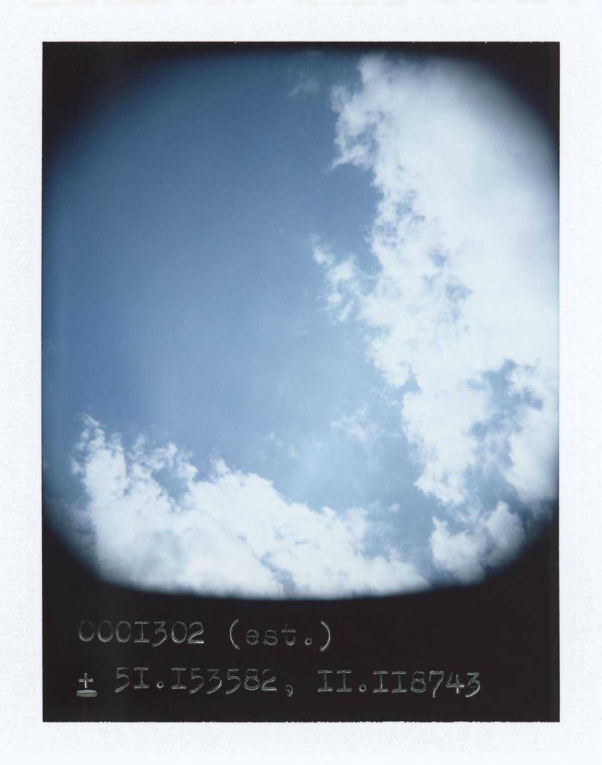 Blue Sky With Clouds and Coordinates