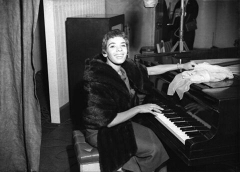 Woman at Grand Piano in Recording Studio