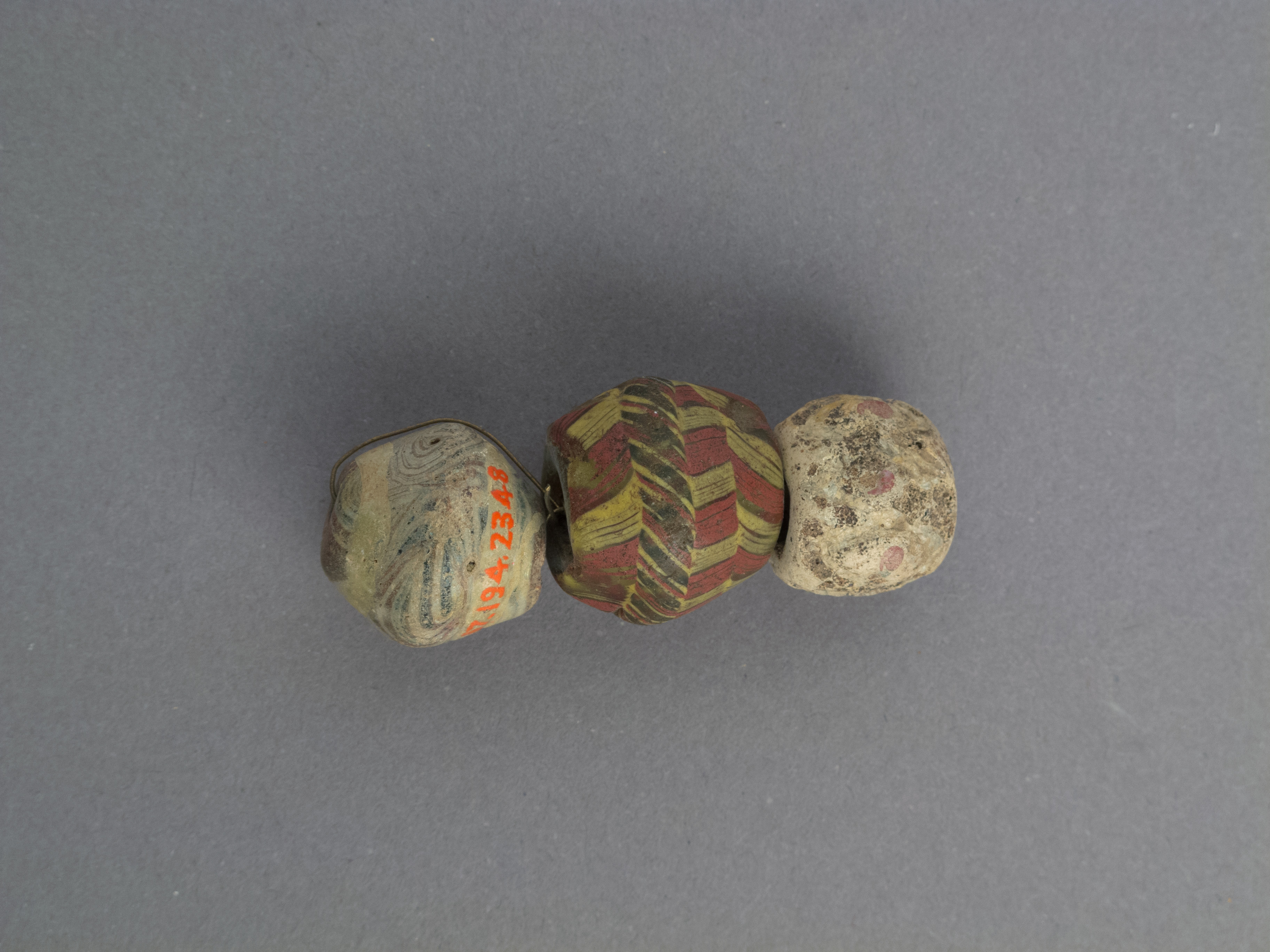 Three Ancient Strung Glass Beads